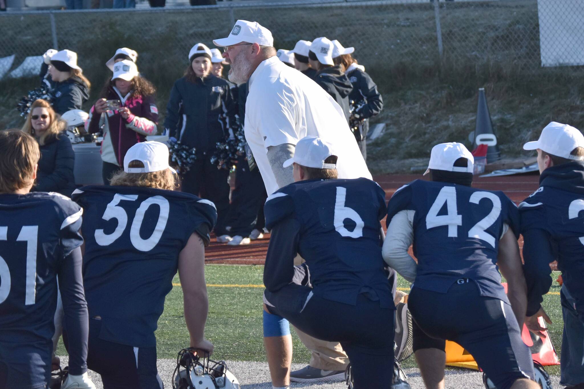 Soldotna head coach Galen Brantley Jr. congratulates his team on Saturday, Oct. 21, 2023, after the Division II championship game at Service High School in Anchorage, Alaska. (Photo by Jeff Helminiak/Peninsula Clarion)