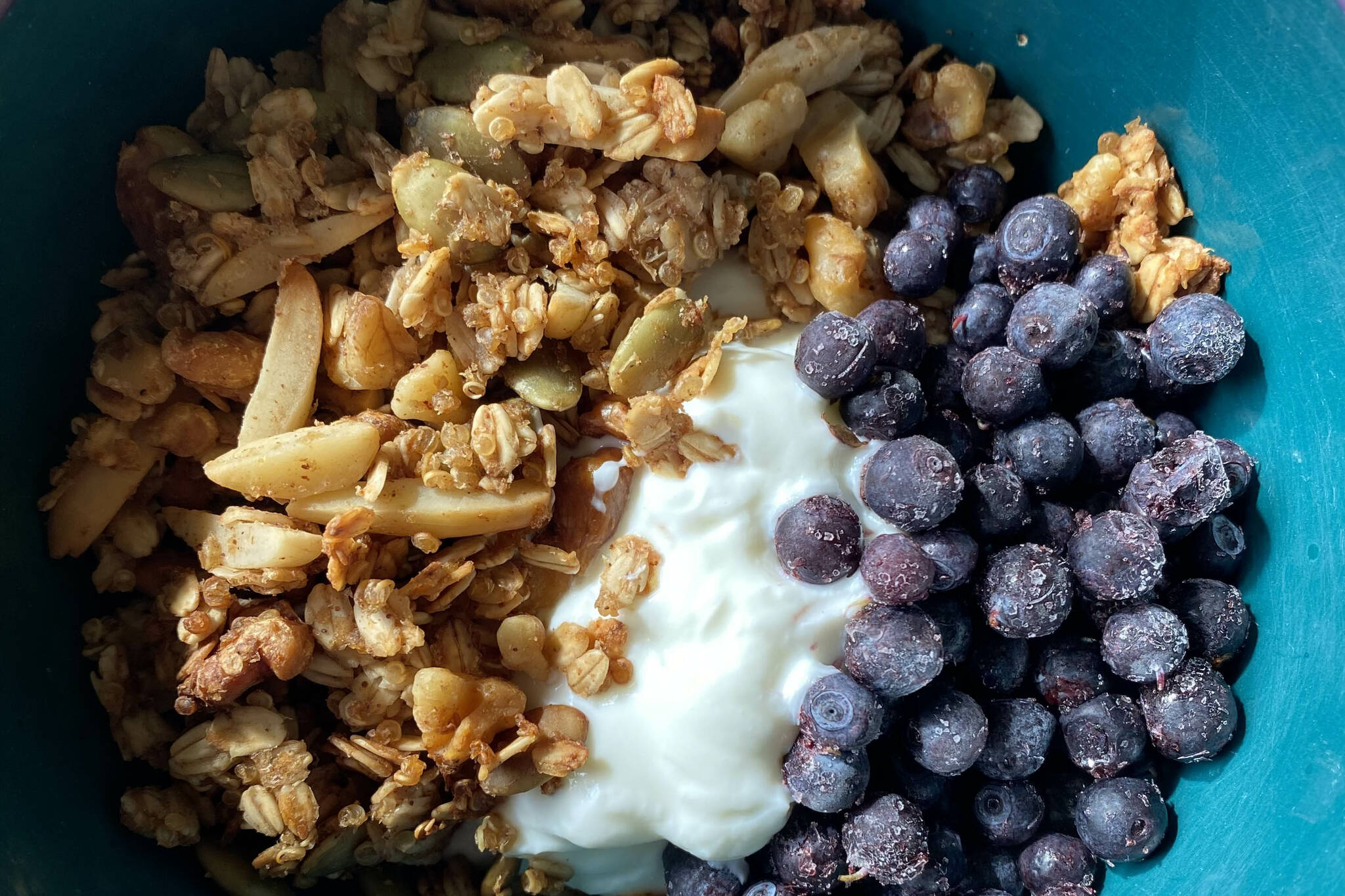 This apple cinnamon quinoa granola is only mildly sweet, perfect as a topping for honeyed yogurt or for eating plain with milk. (Photo by Tressa Dale/Peninsula Clarion)