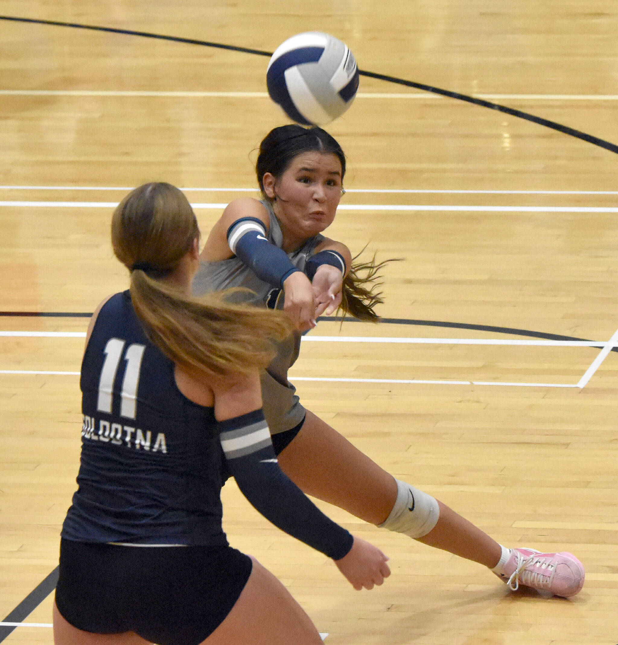 Soldotna’s Kiona Dexter digs up a ball Thursday, Sept. 5, 2024, at Soldotna High School in Soldotna, Alaska. (Photo by Jeff Helminiak/Peninsula Clarion)