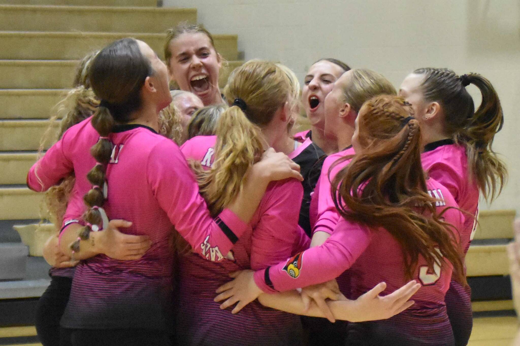 Kenai Central celebrates winning the title Saturday, Sept. 7, 2024, at the 17th Annual Shayna Pritchard Memorial Volleyball Tournament at Nikiski Middle-High School in Nikiski, Alaska. (Photo by Jeff Helminiak/Peninsula Clarion)