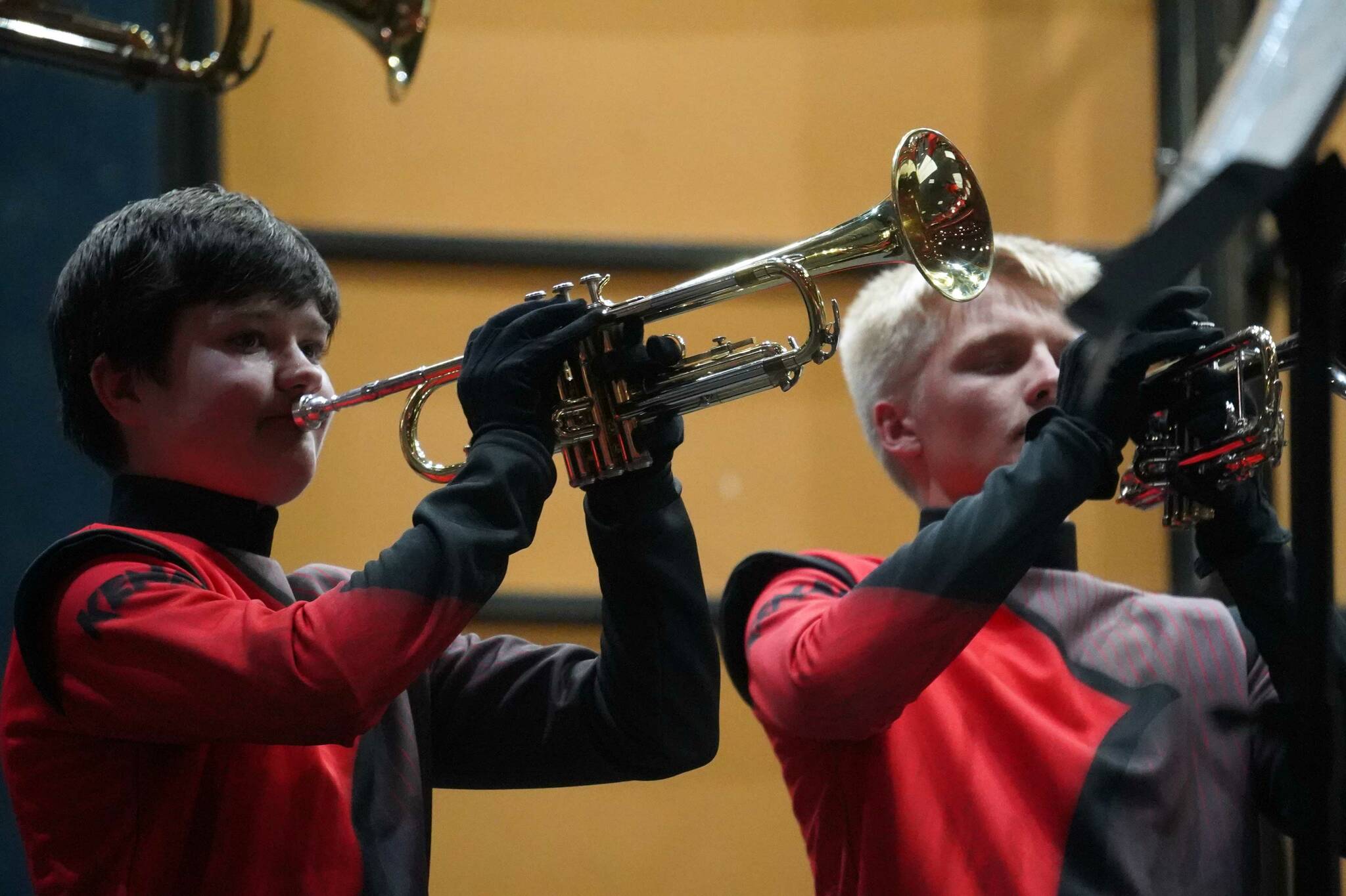 The Kenai Marching Band debuts their new routine based on “The Hunger Games: The Ballad of Songbirds & Snakes” during an exhibition at Kenai Central High School on Friday, Aug. 16, 2024. (Jake Dye/Peninsula Clarion)