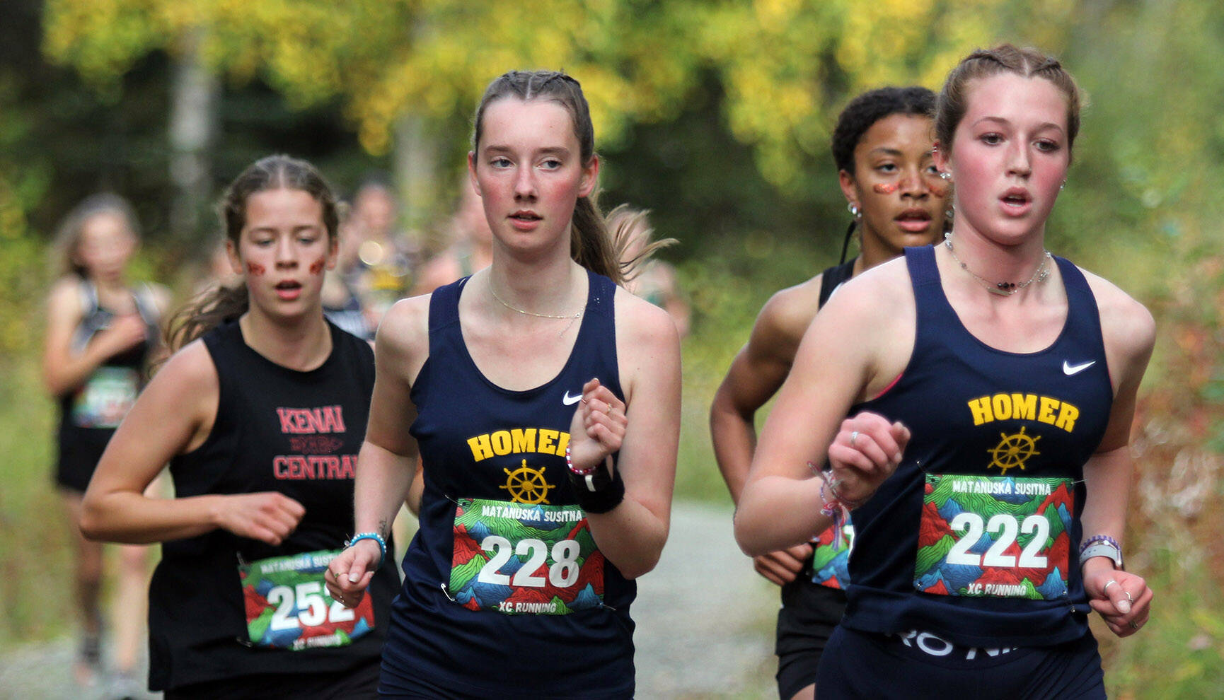 Homer’s Claira Booz, right, and Beatrix McDonough, left, lead a small pack of runners during the Wasilla Trailblazer Invite on Friday, Sept. 13, 2024, in Wasilla, Alaska. (Photo by Jeremiah Bartz/Frontiersman)