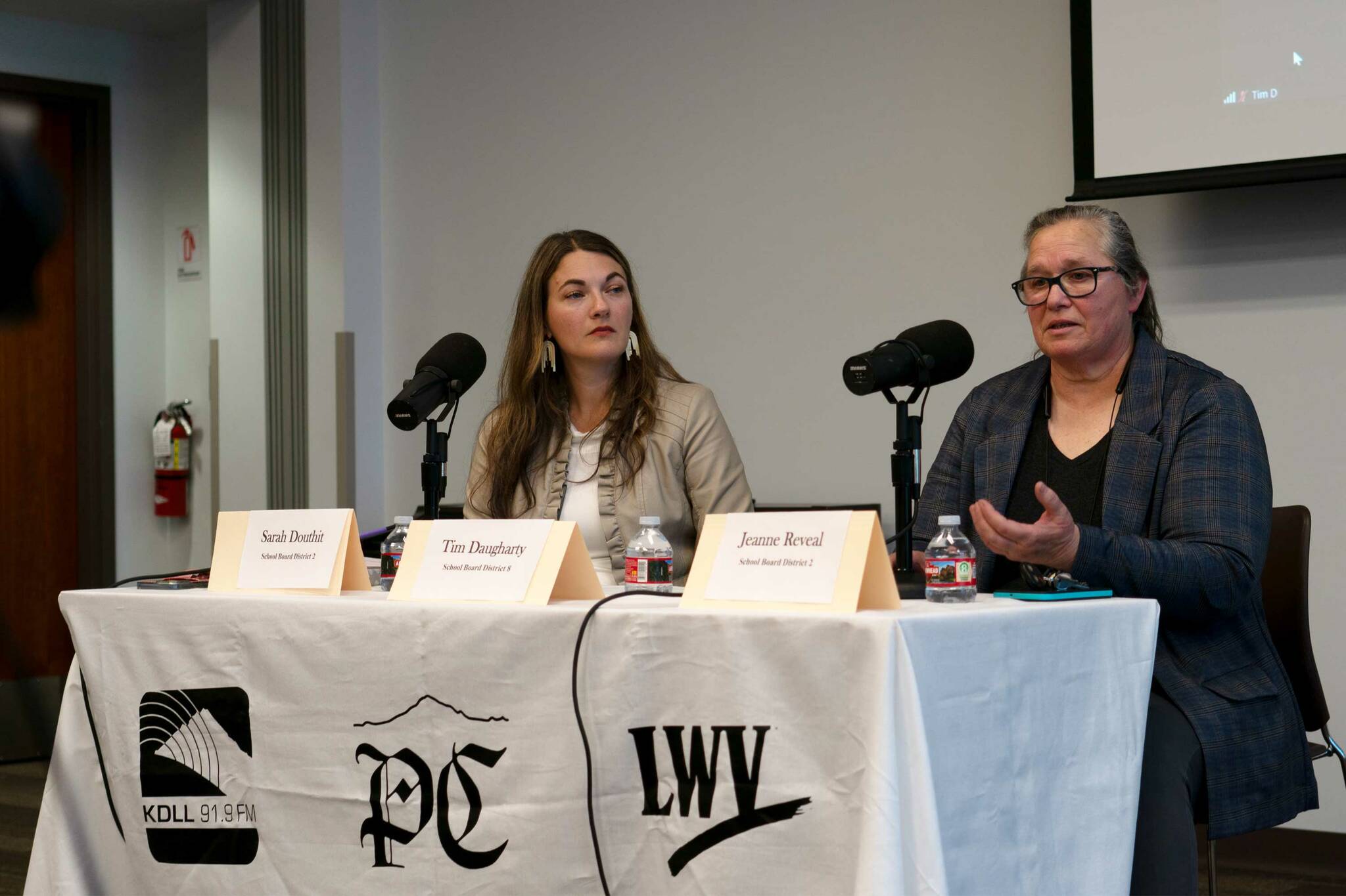 Sarah Douthit and Jeanne Reveal participate in a candidate forum for the Kenai Peninsula Borough School District Board of Education at the Soldotna Public Library in Soldotna, Alaska, on Monday, Sept. 16, 2024. (Jamie Diep/KBBI)