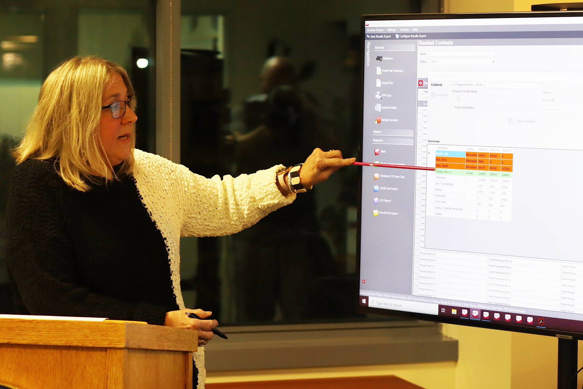 This November 2022 file photos shows Alaska Division of Elections Director Gail Fenumiai explaining the ranked choice tabulation for the 2022 U.S. House race. Democratic incumbent Mary Peltola prevailed over Republican former Gov. Sarah Palin by a final tally of 54.9% to 45.1% after lower-finishing candidates Republican Nick Begich III amd Libertarian Chris Bye were eliminated during the first two rounds of instant choice runoffs. (Mark Sabbatini/Juneau Empire file)