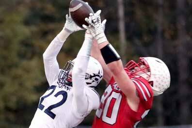 Soldotna's Matthew Schilling knocks the ball away from Wasilla's Jimmy Lackey during a 63-21 win over the Warriors Friday, Sept. 20, 2024, at Veterans Memorial Field in Wasilla, Alaska. (Bruce Eggleston/matsusports.net)