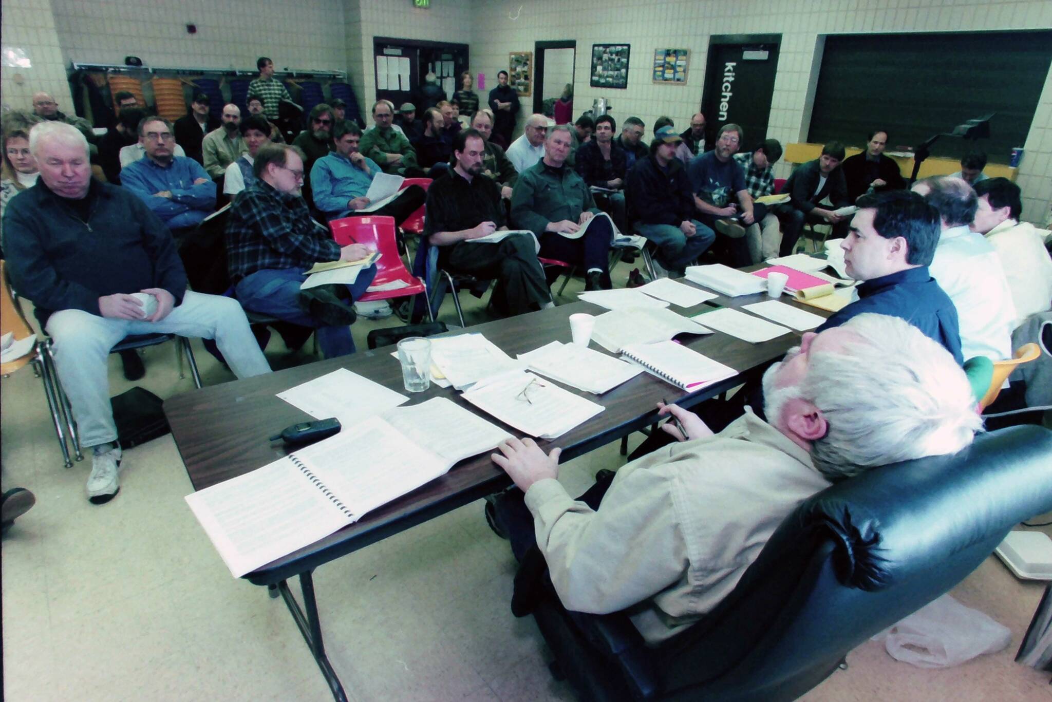 Seats are filled as the Alaska Board of Fisheries meets at the Soldotna Regional Sports Complex in Soldotna, Alaska, on Feb. 24, 1999. (M. Scott Moon/Peninsula Clarion file)