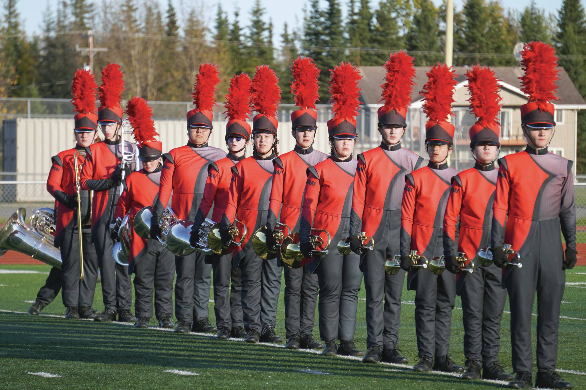 Jake Dye/Peninsula Clarion
The Kenai Central High School Marching Band performs “Snakes and Songbirds: The Music of the Hunger Games” during the Kenai Marching Showcase at Ed Hollier Field in Kenai on Saturday.