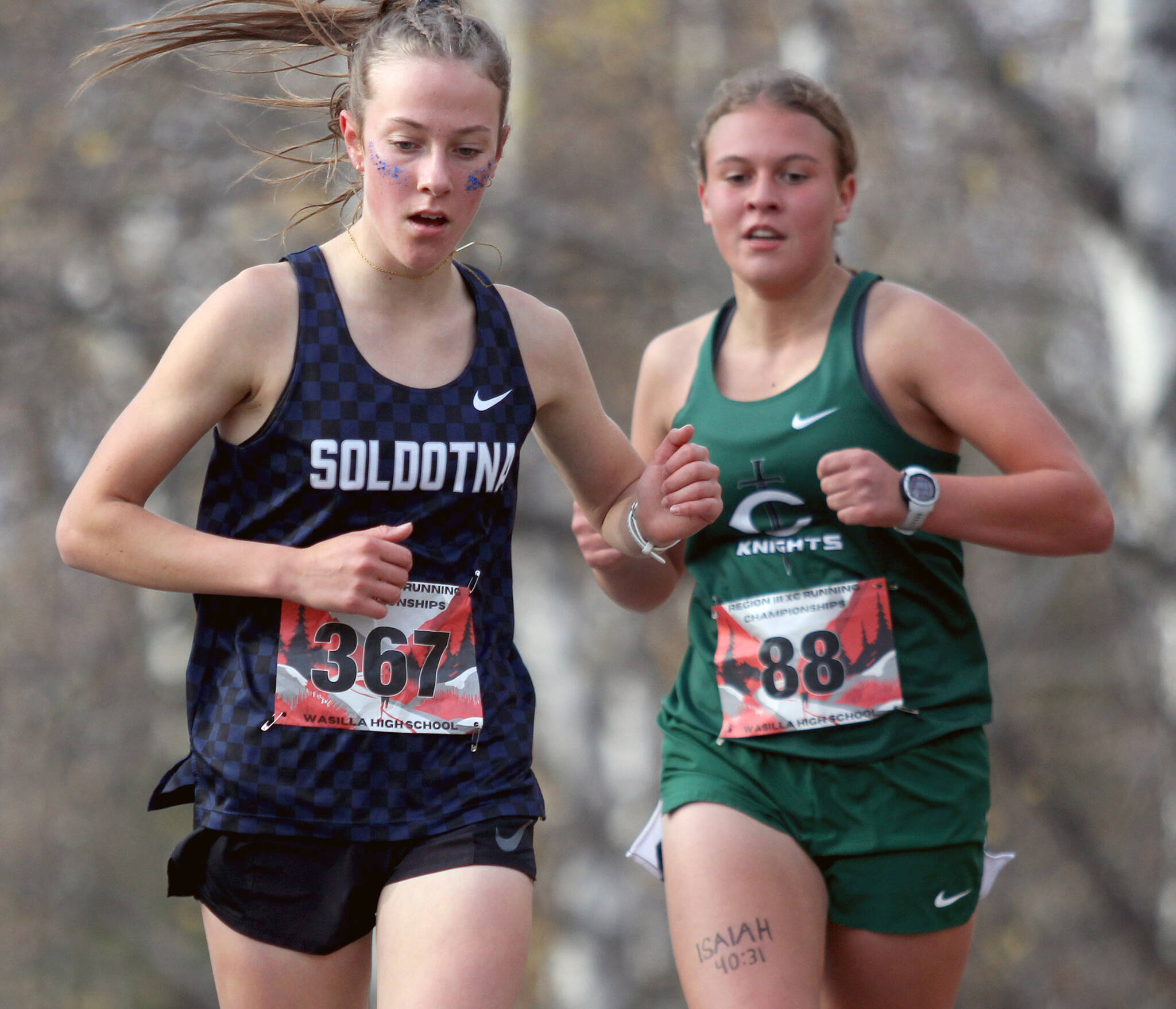 Soldotnaճ Tania Boonstra runs just ahead of Colonyճ Aubrey Virgin during the Division I varsity girls race of the Region 3 Championships on Saturday, Sept. 28, 2024, in Wasilla, Alaska. (Photo by Jeremiah Bartz/Frontiersman)