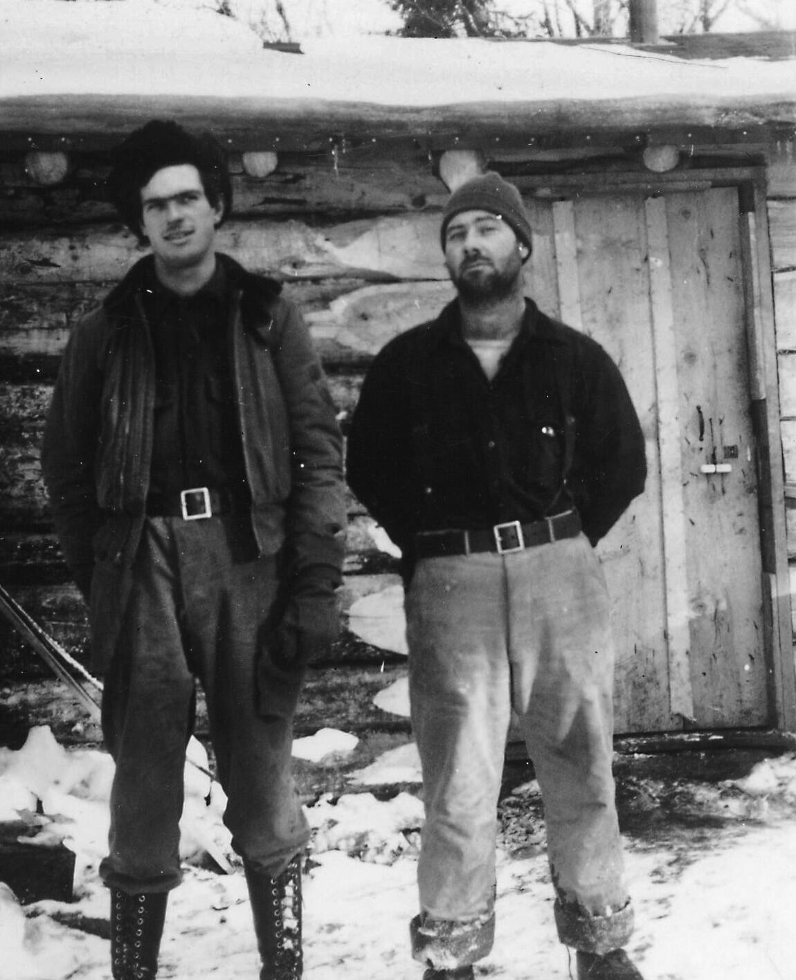 Photo courtesy of Katie Matthews
Wayne Jones (left) and William “Bill” Nutter, circa 1948-49, pose in front of the Happy Valley cabin that Nutter shared with his brother James.