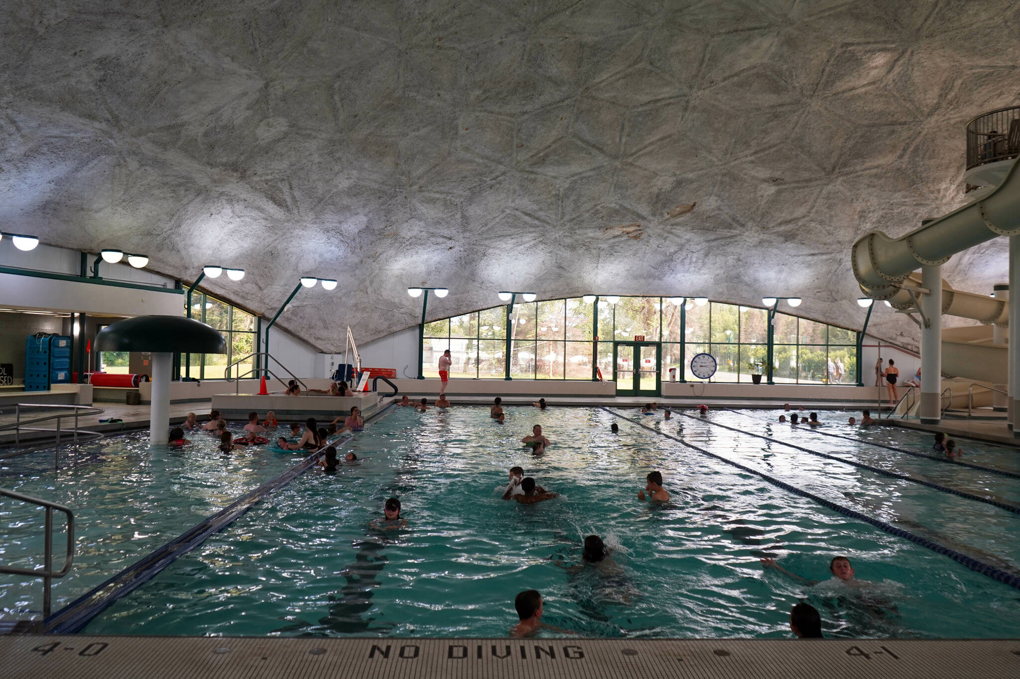 Well over 50 people enjoy the Nikiski Pool during a celebration of the 50th anniversary of the North Peninsula Recreation Service Area in Nikiski, Alaska, on Saturday, Aug. 3, 2024. (Jake Dye/Peninsula Clarion)