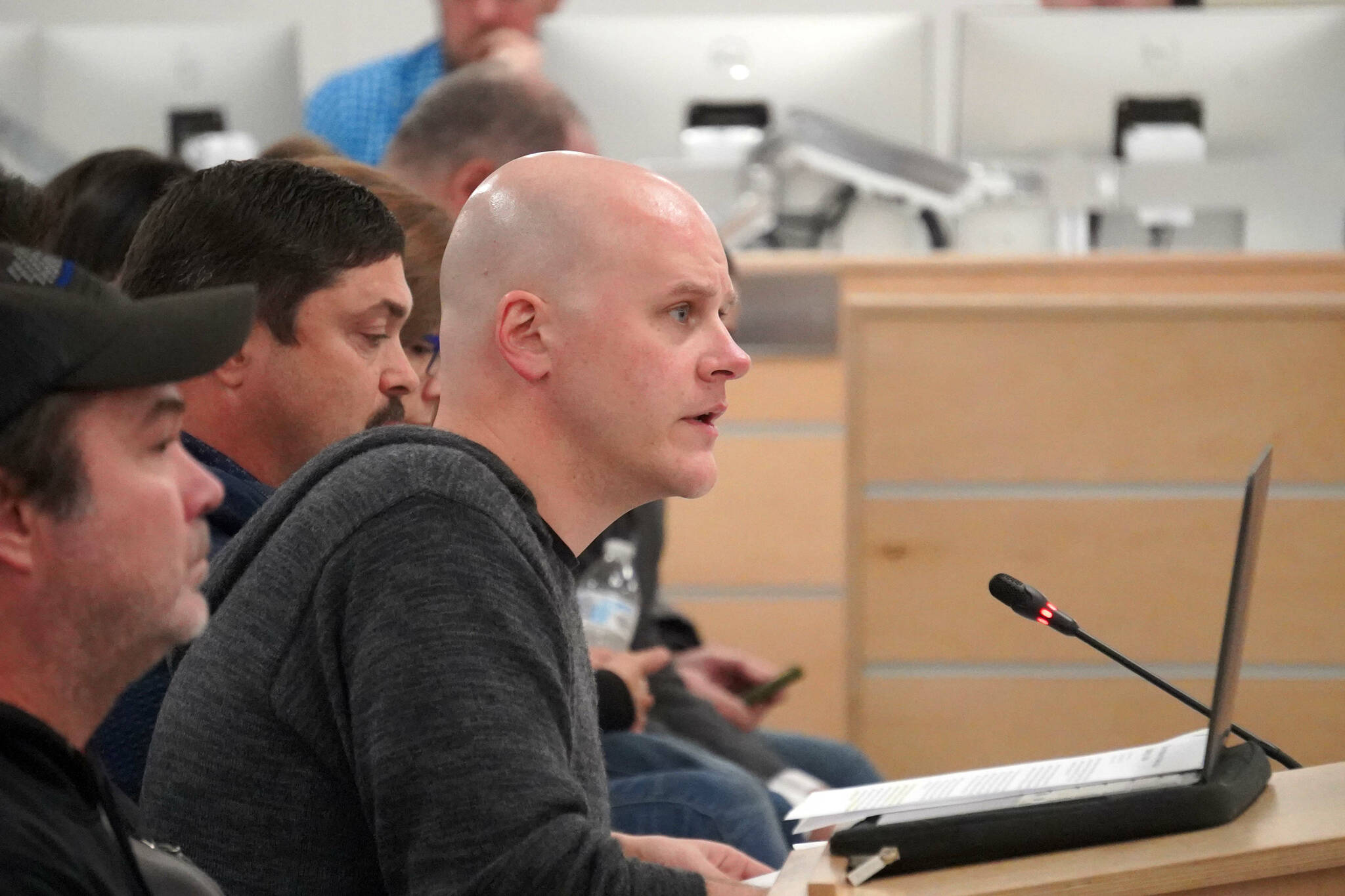 Aurora Borealis Charter School Academic Policy Committee Chair Daniel Mahr speaks during a meeting of the Kenai Peninsula Borough School District Charter Oversight Committee in Soldotna, Alaska, on Monday, Oct. 21, 2024. (Jake Dye/Peninsula Clarion)