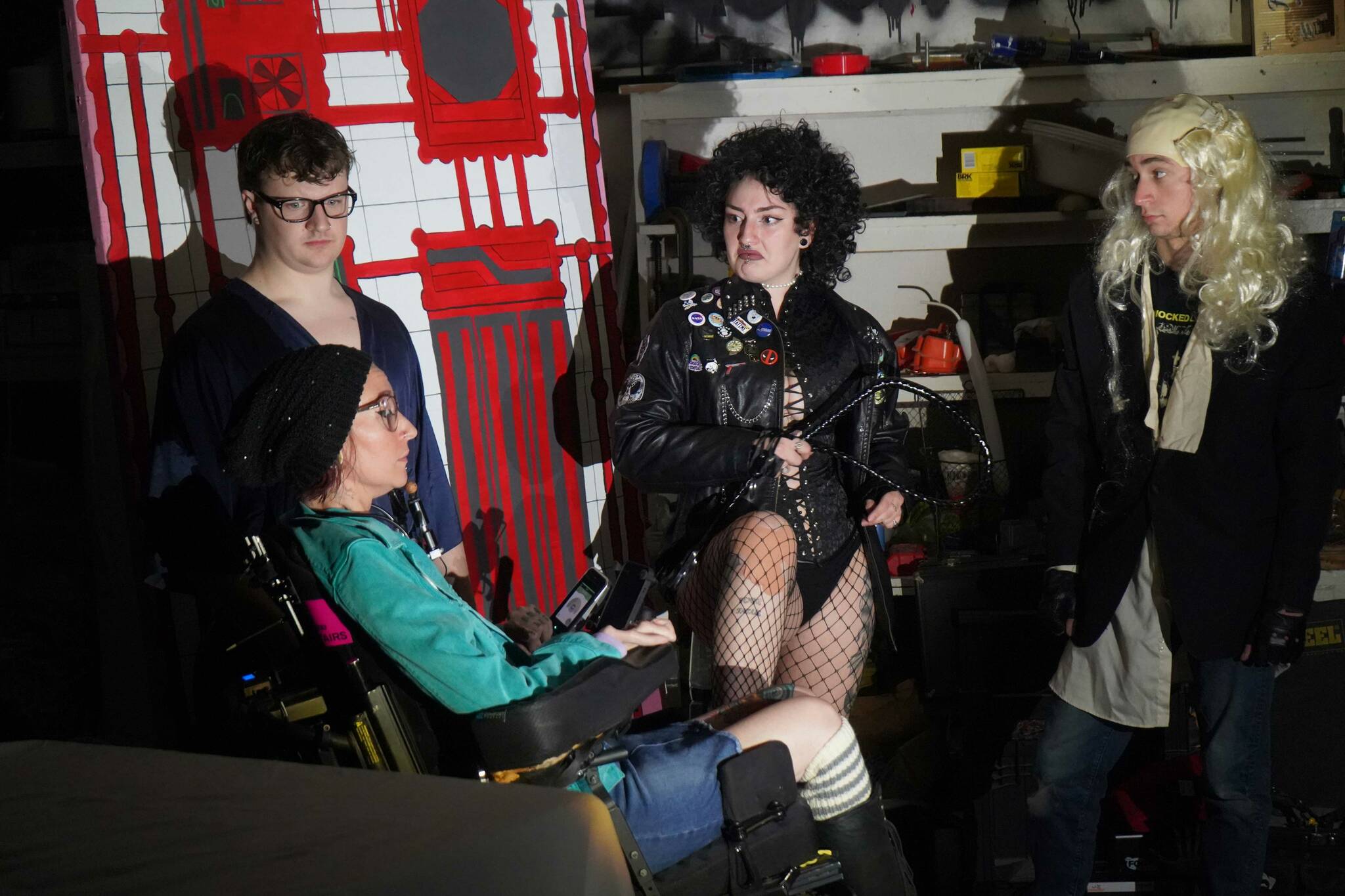 The cast of Intuition Salon’s shadow cast of “Rocky Horror Picture Show” rehearse in Kenai, Alaska, on Monday, Oct. 21, 2024. (Jake Dye/Peninsula Clarion)