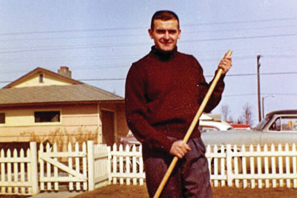 Harold Galliett, the sole survivor of a 1965 Cordova Airlines crash into Tustumena Lake, is seen here raking his lawn in 1958. (Photo courtesy of the Galliett Family Collection)