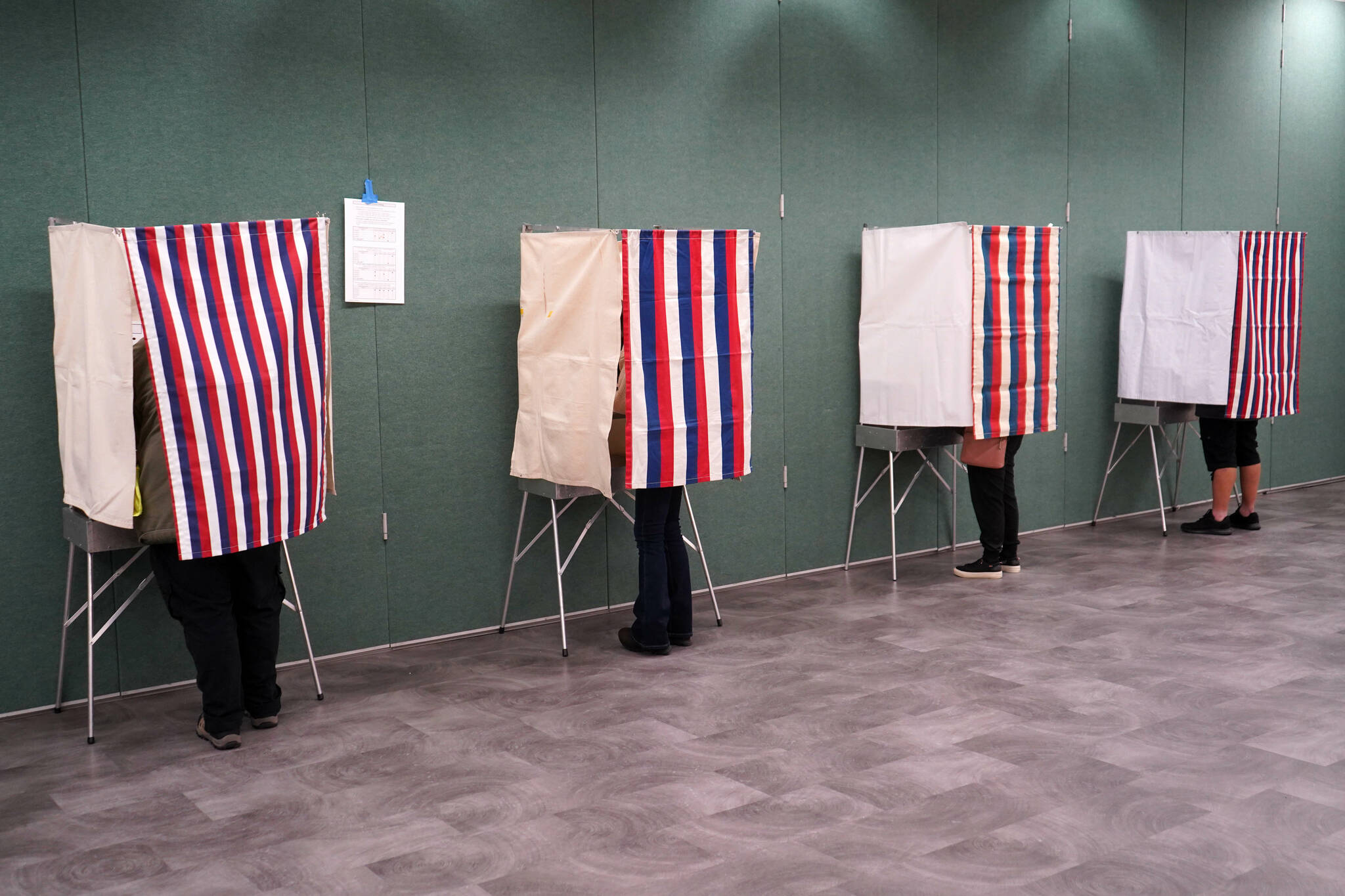 Voting booths are filled at the Kenai No. 2 precinct, the Challenger Learning Center of Alaska in Kenai, Alaska, on Tuesday, Nov. 5, 2024. (Jake Dye/Peninsula Clarion)