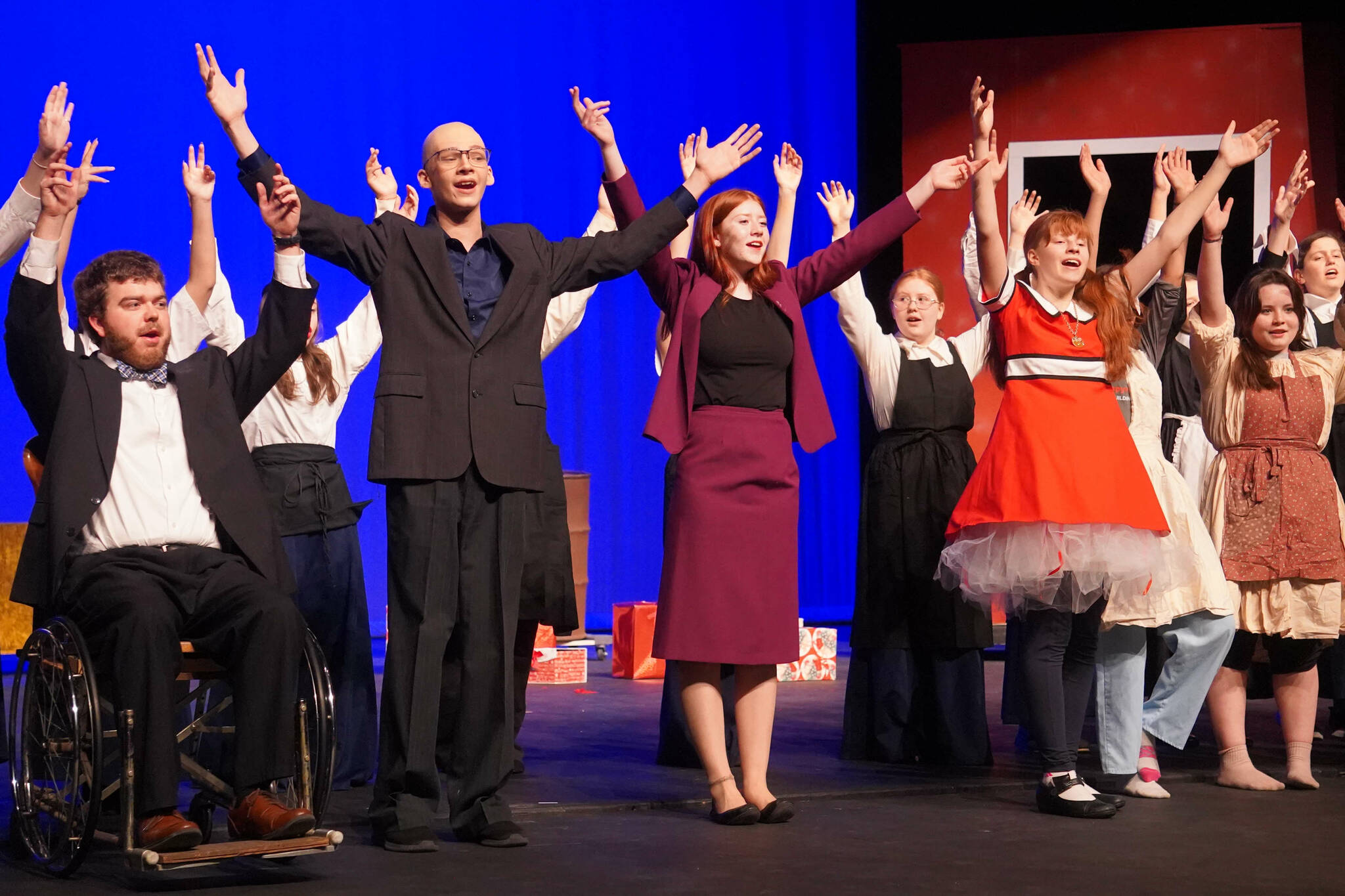 The cast of “Annie” rehearse at Kenai Central High School in Kenai, Alaska, on Wednesday, Nov. 6, 2024. (Jake Dye/Peninsula Clarion)