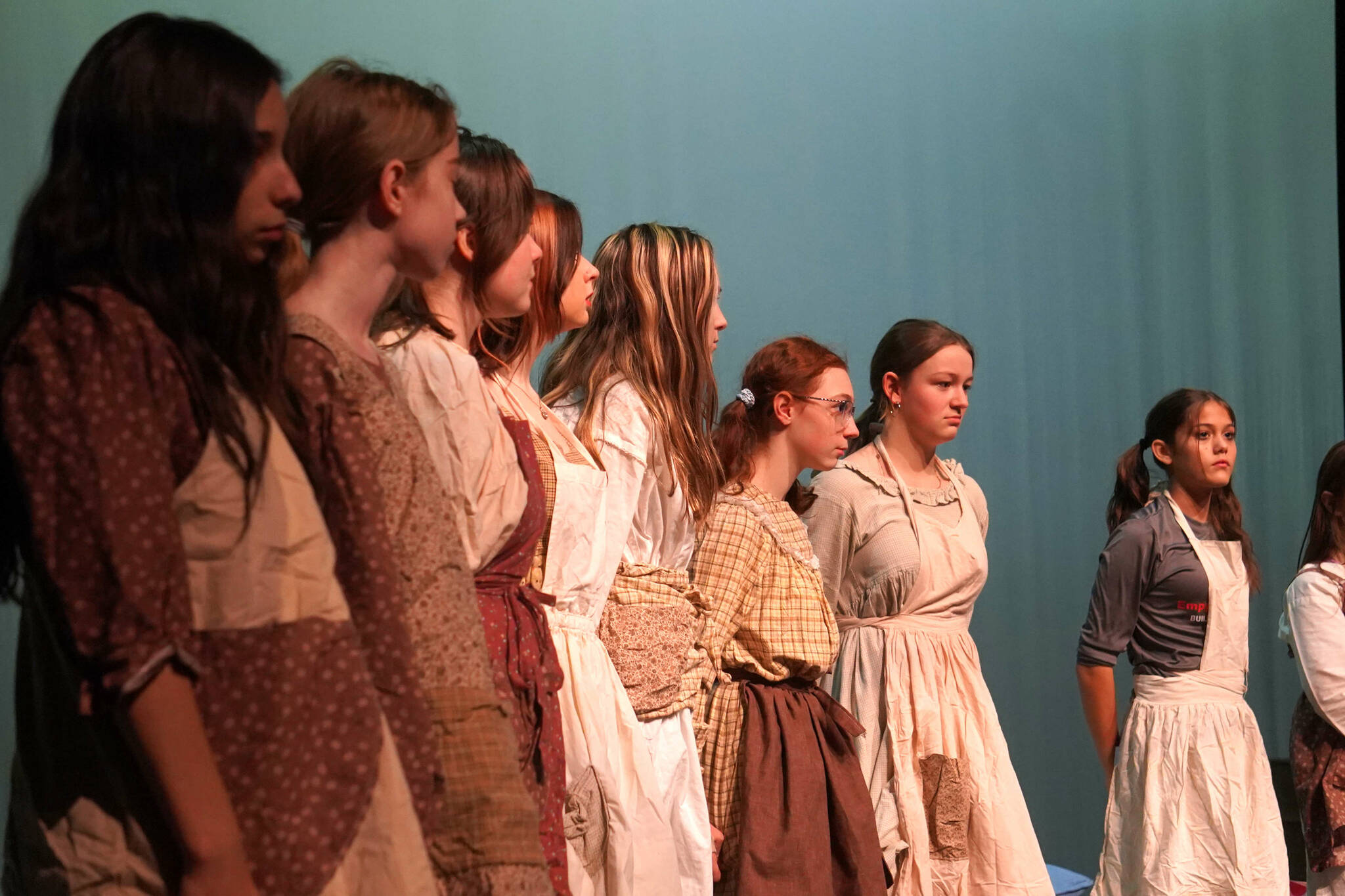 The cast of “Annie” rehearse at Kenai Central High School in Kenai, Alaska, on Wednesday, Nov. 6, 2024. (Jake Dye/Peninsula Clarion)