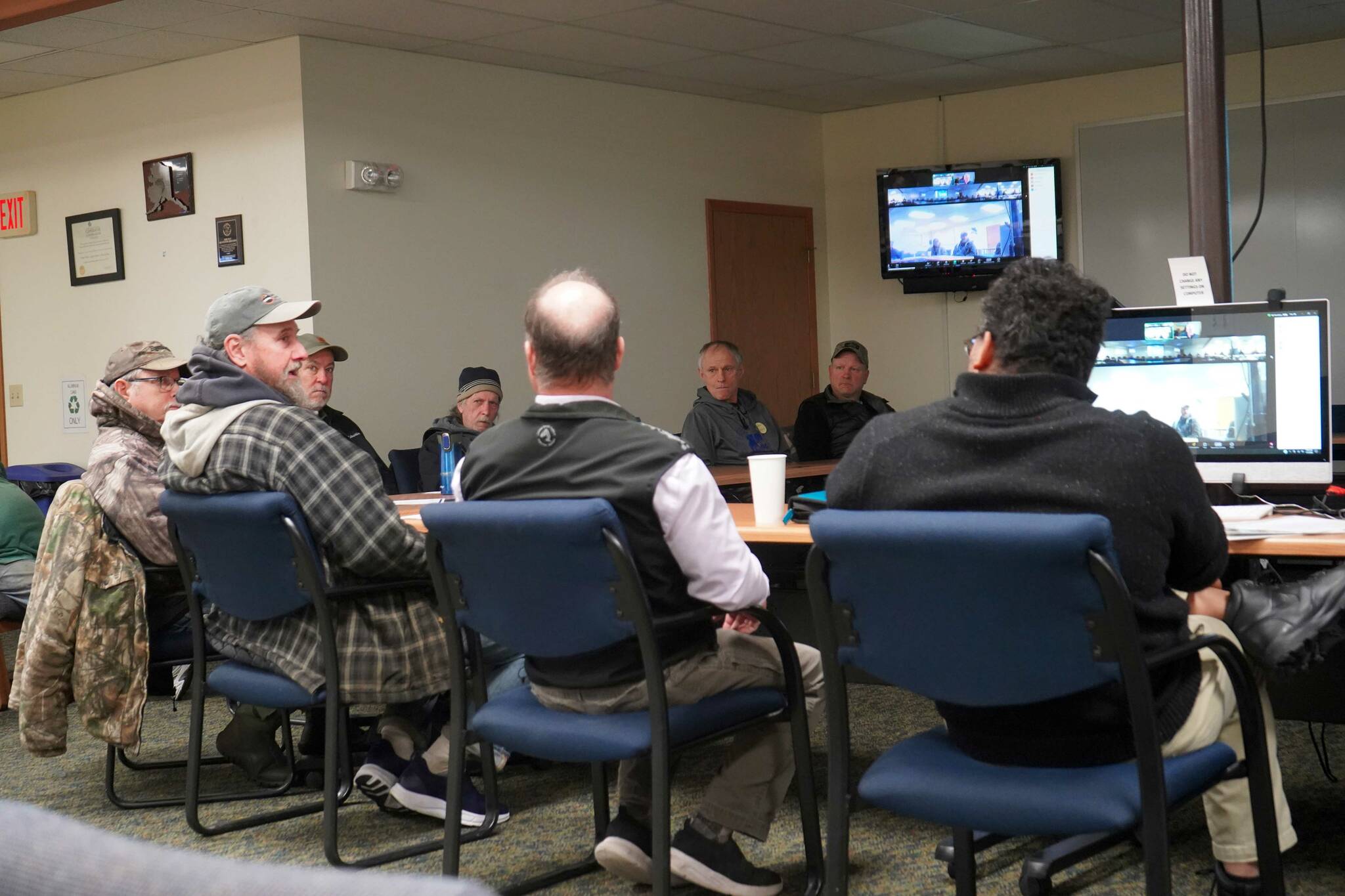 Commercial fishers speak to the Commercial Fisheries Entry Commission during a public hearing on a proposed regulation change to add dipnets to the east side setnet fishery at Cook Inlet Aquaculture Association in Kenai, Alaska, on Saturday, Nov. 2, 2024. (Jake Dye/Peninsula Clarion)