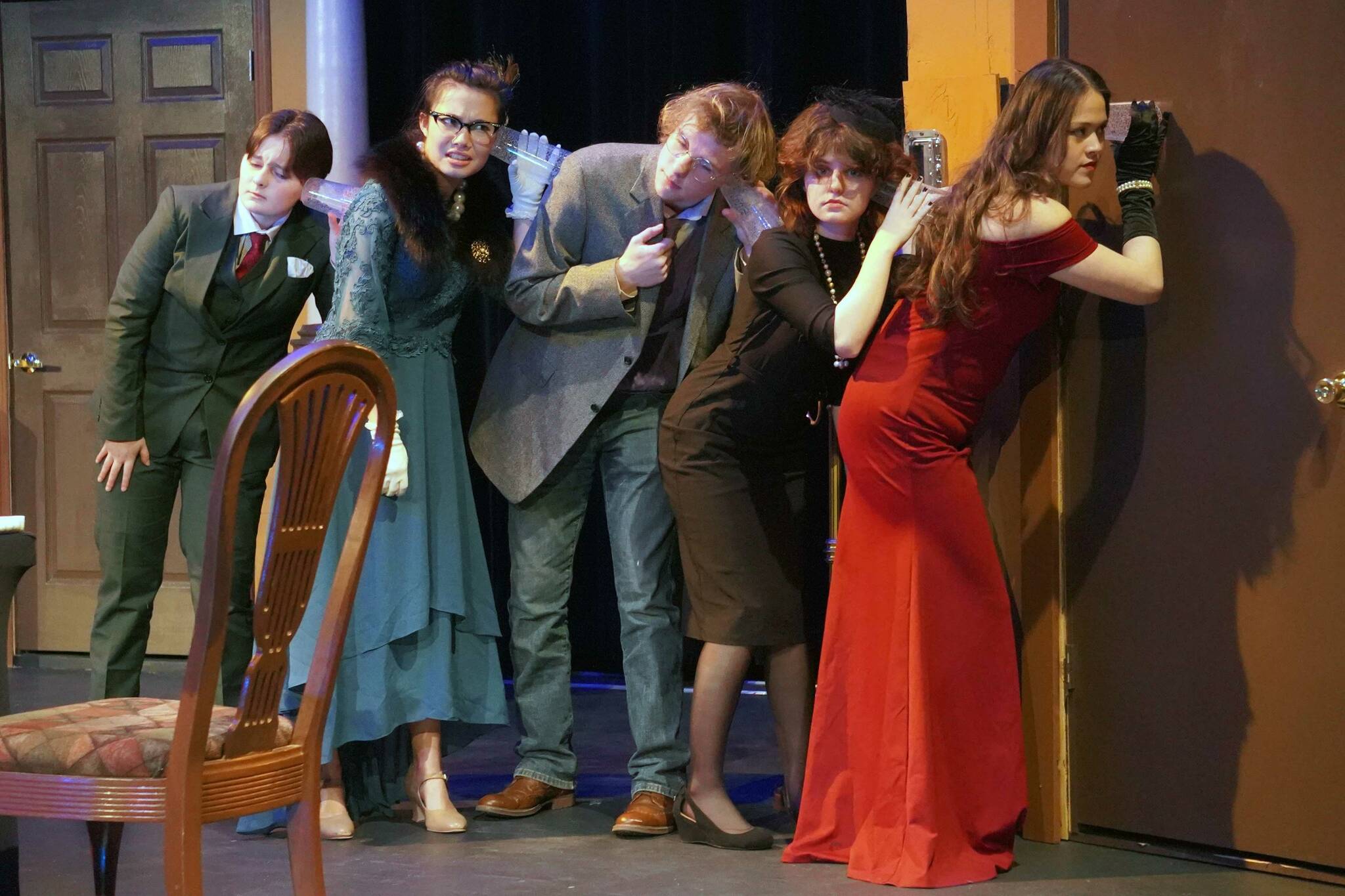 The cast of Seward High School Theatre Collective’s “Clue” rehearse at Seward High School in Seward, Alaska, on Thursday, Nov. 7, 2024. (Jake Dye/Peninsula Clarion)