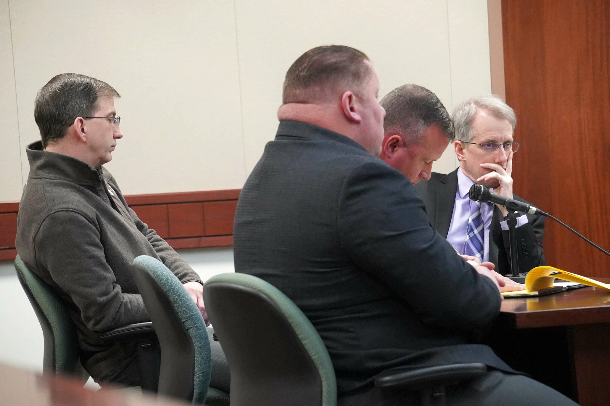 From left: Joseph Miller Jr. and Jason Woodruff, Alaska State Troopers charged with felony first-degree assault, appear with their lawyers, Clinton Campion and Matthew Widmer, for an arraignment at the Kenai Courthouse in Kenai, Alaska, on Thursday, Nov. 14, 2024. (Jake Dye/Peninsula Clarion)