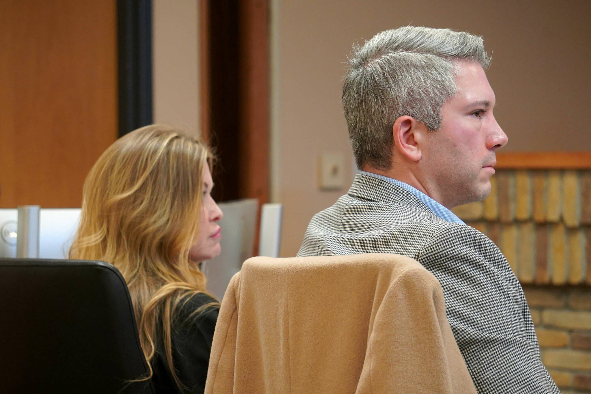 Canna Get Happy owner Sandra Millhouse, left, appears with attorney Richard Moses during a meeting of the Board of Adjustment at Kenai City Hall in Kenai, Alaska, on Oct. 15, 2024. (Jake Dye/Peninsula Clarion)