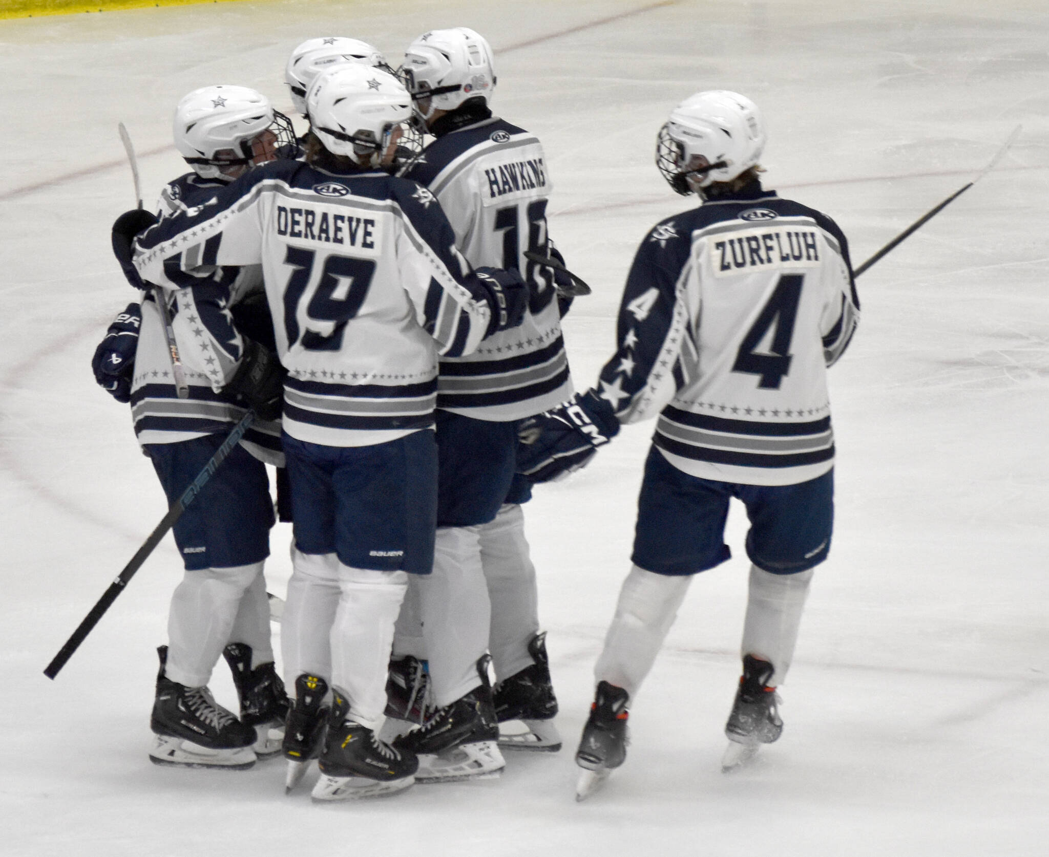 Soldotna celebrates a goal by Daniel Heath on Friday, Nov. 15, 2024, at the Soldotna Regional Sports Complex in Soldotna, Alaska. (Photo by Jonas Oyoumick/Peninsula Clarion)