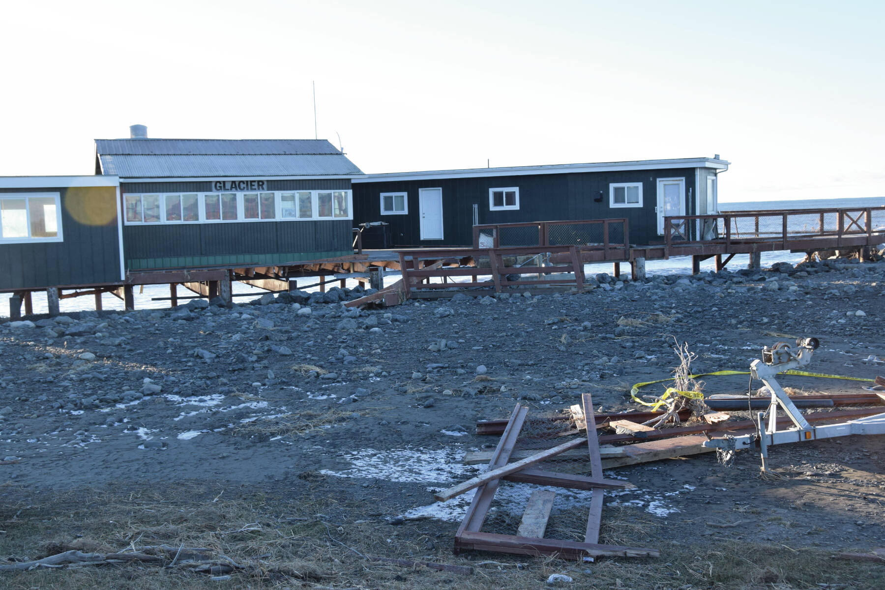 Debris and damage to the Glacier D restaurant is seen on Monday, Nov. 18,<ins> 2024,</ins> following a storm event that caused erosion damage to the Homer Spit on Saturday<ins> in Homer, Alaska</ins>. (Delcenia Cosman/Homer News)