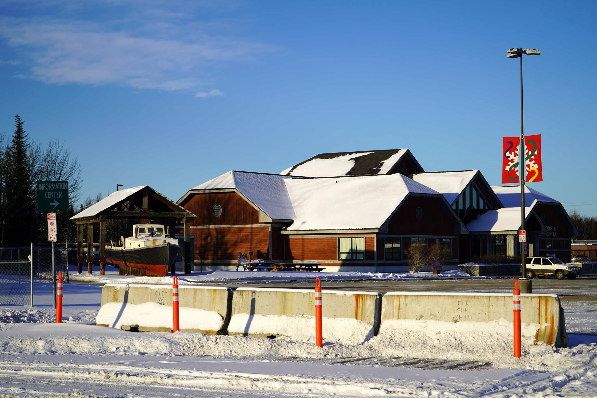 The entrance to the Kenai Chamber of Commerce and Visitor Center is barricaded on Overland Avenue in Kenai, Alaska, on Thursday, Nov. 21, 2024. (Jake Dye/Peninsula Clarion)