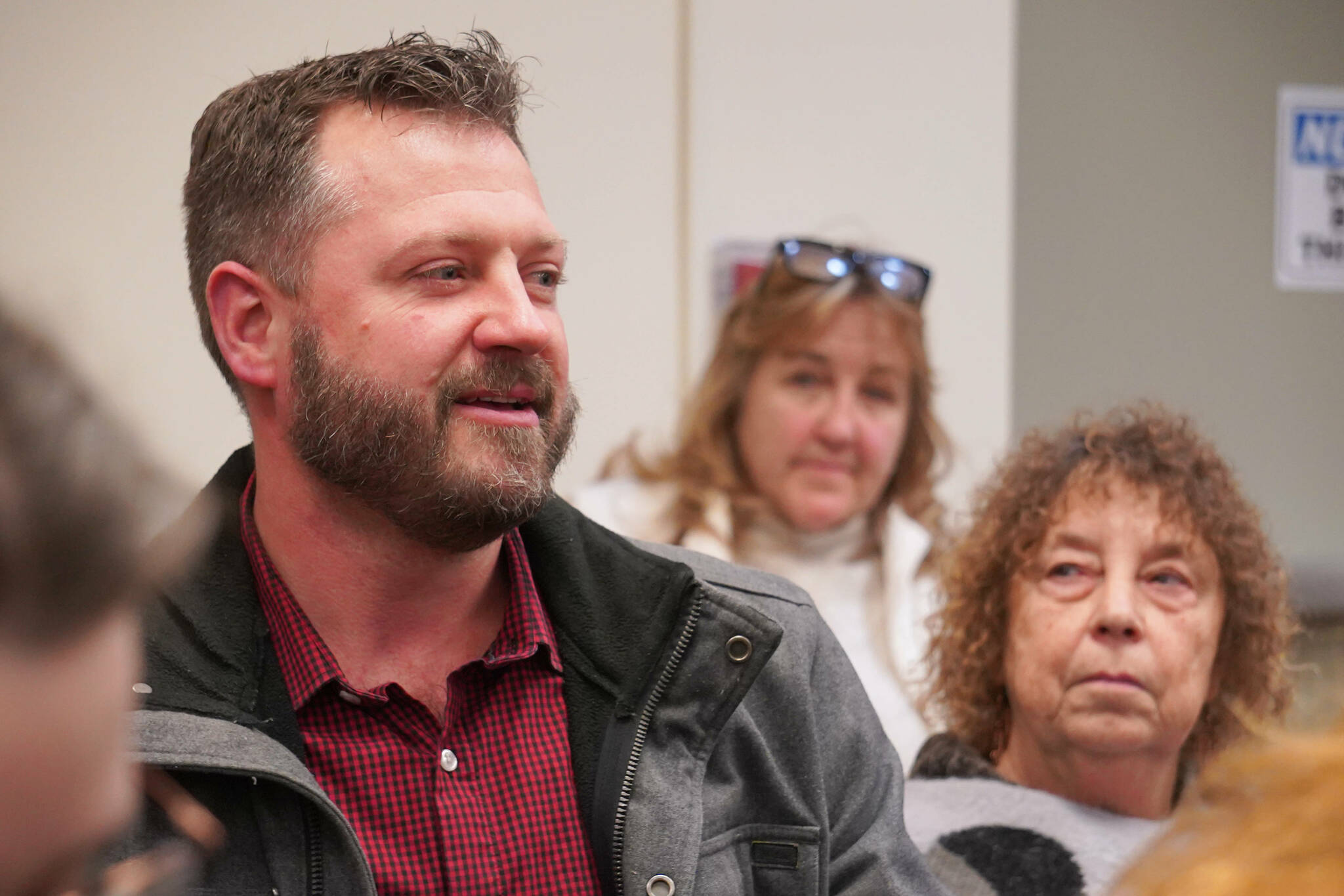 Evan Frisk calls for full-time staffing of the Central Emergency Services’ Kasilof station during a meeting of the CES Joint Operational Service Area Board on Thursday, Nov. 21, 2024, at Soldotna Prep School in Soldotna, Alaska. (Jake Dye/Peninsula Clarion)