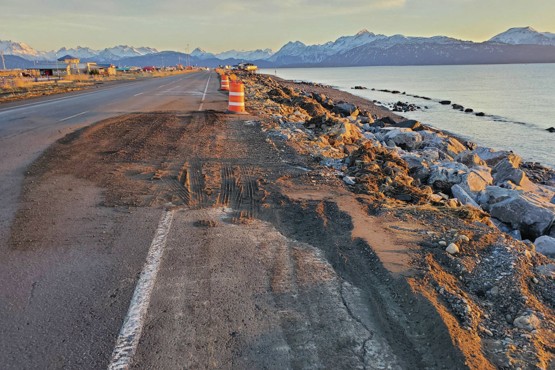 The southbound lane of Homer Spit Road, which was damaged by the Nov. 16 storm surge, is temporarily repaired with gravel and reopened on Thursday, Nov. 21, 2024, in Homer, Alaska. (Delcenia Cosman/Homer News)