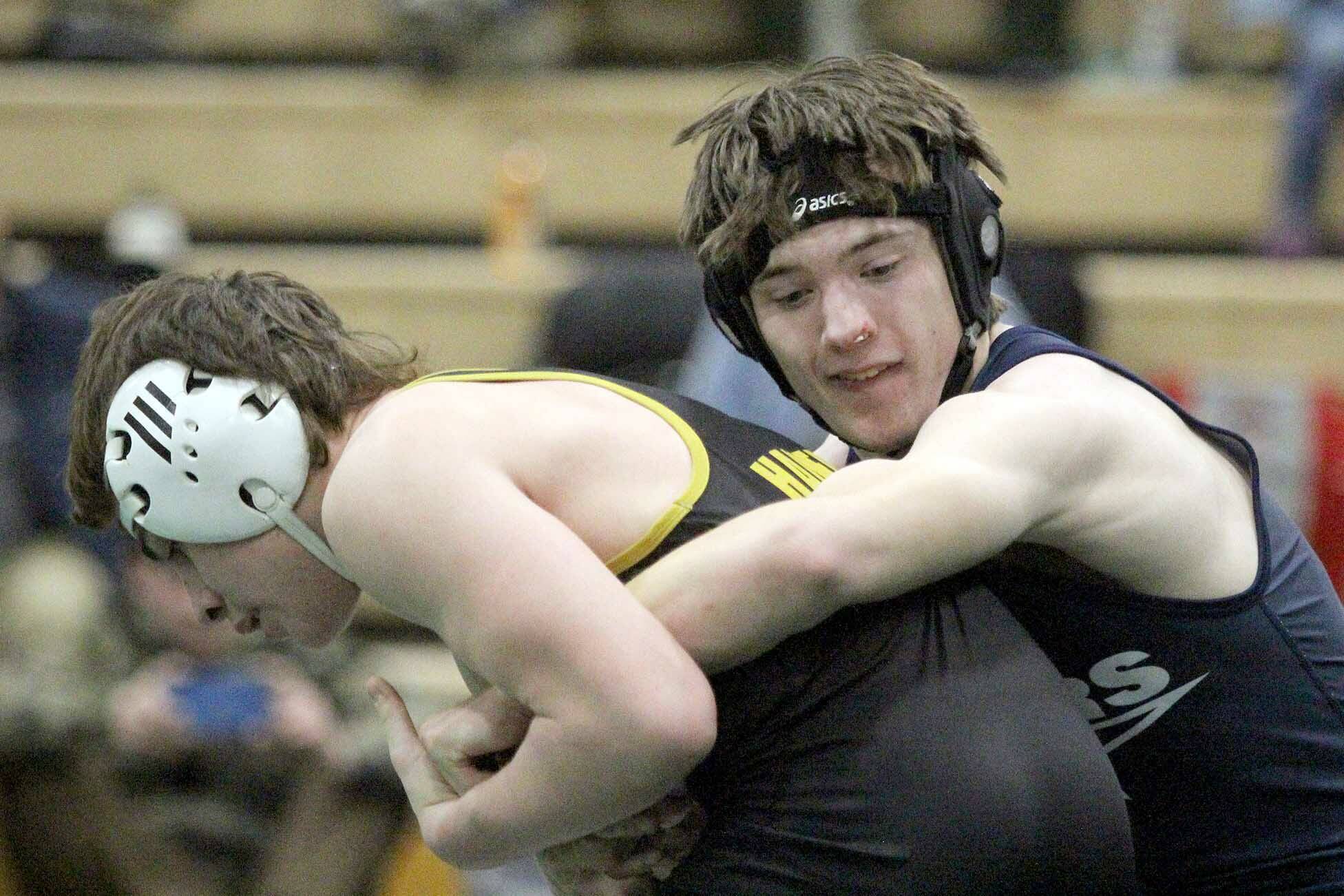 Soldotnaճ Carson Cobb maintains a hold of Jett Connolly of the Student Wrestling Development Program during the 130-pound final of the Colony Invitational on Saturday, Nov. 23, 2024, at Colony High School in Palmer. (Photo by Jeremiah Bartz/Frontiersman)