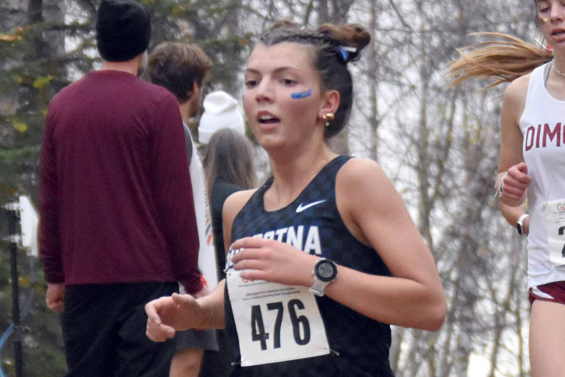 Soldotna's Annie Burns competes in the Division I girls race at the state cross-country running meet on Saturday, Oct. 5, 2024, at Bartlett High School in Anchorage, Alaska. (Photo by Jeff Helminiak/Peninsula Clarion)