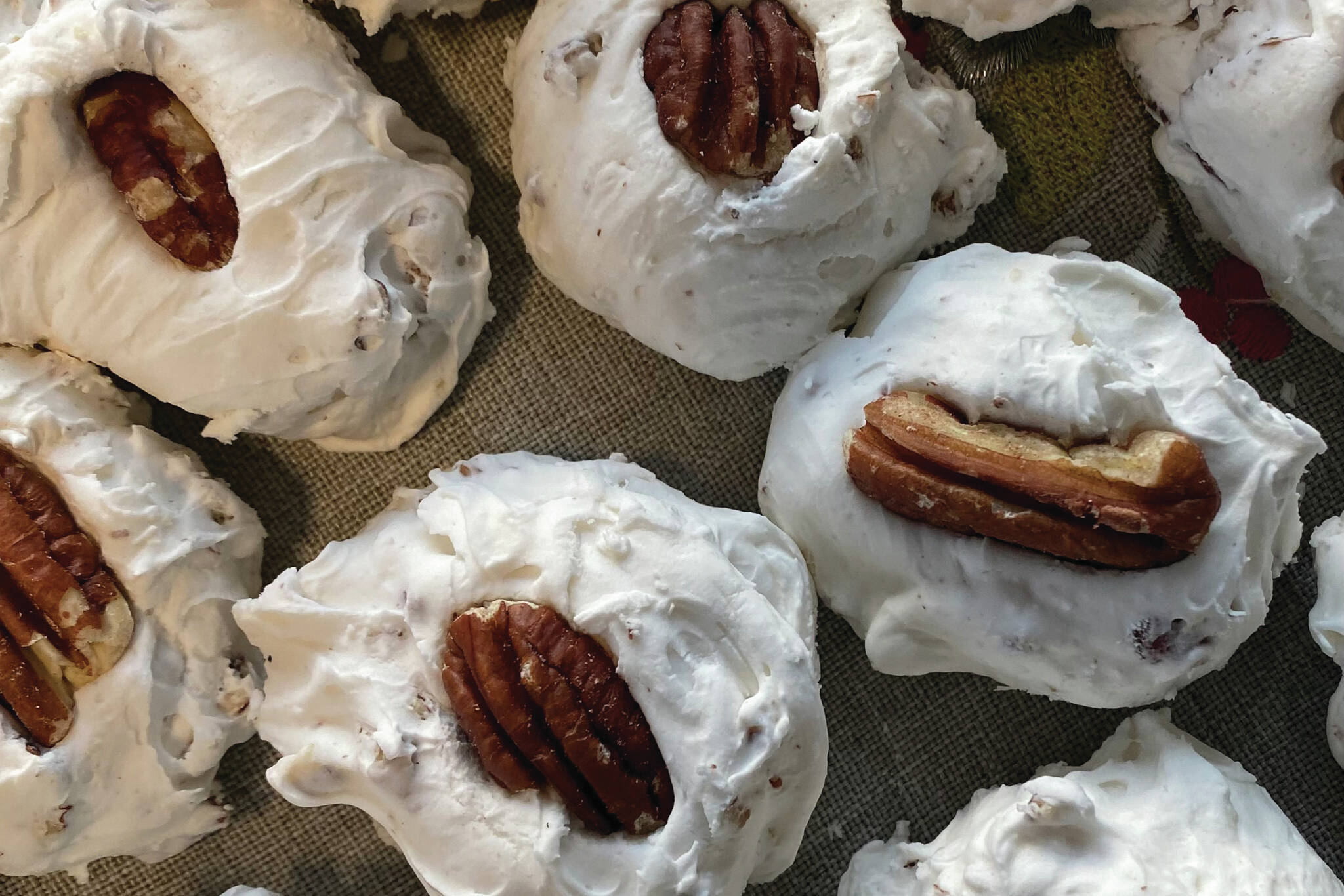 These traditional southern Christmas Divinity Cookies are soft, extremely sweet and might provide some nostalgic joy. (Photo by Tressa Dale/Peninsula Clarion)