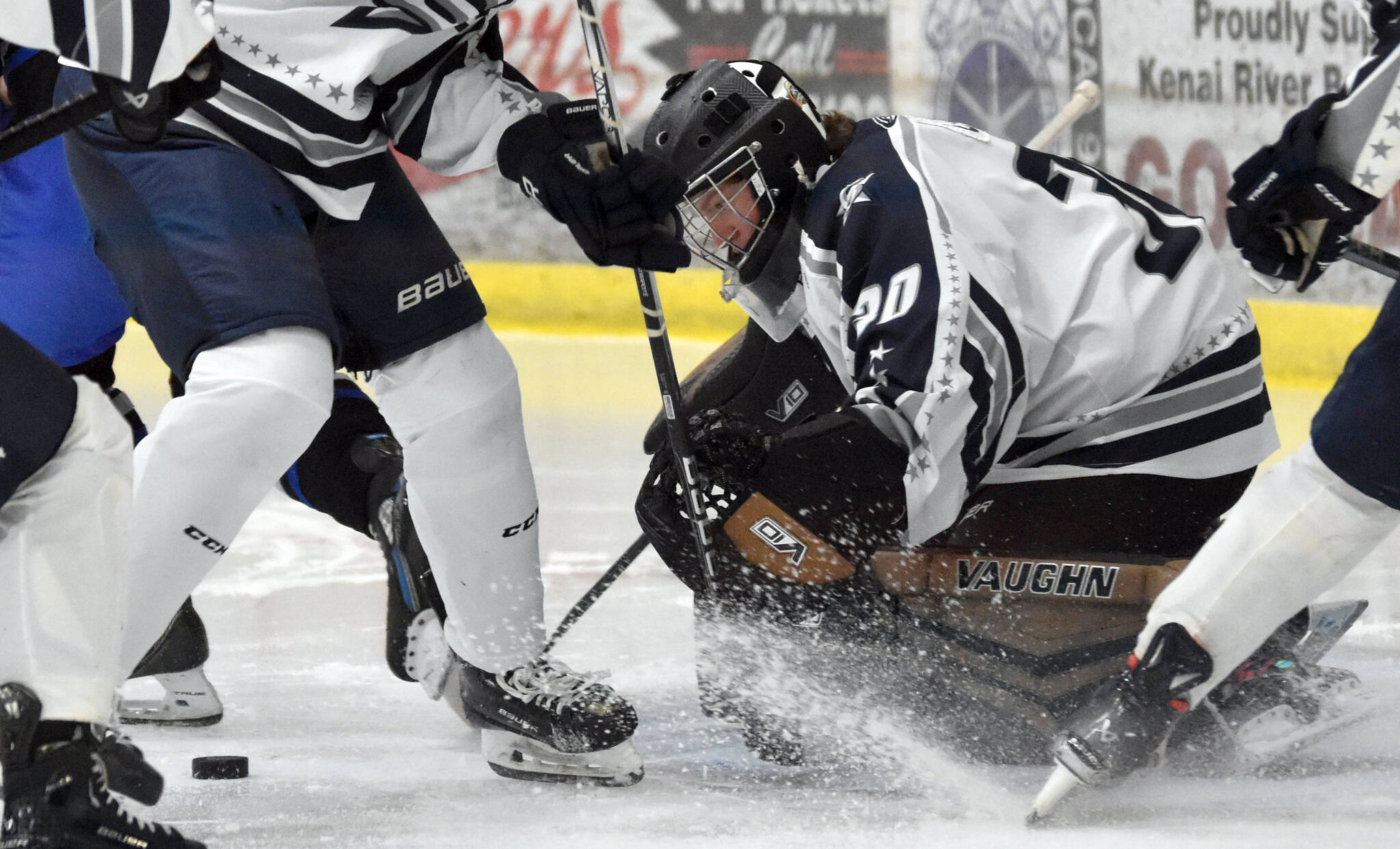 Soldotna goalie Brycen Clyde tracks the puck for a save Friday, Dec. 6, 2024, at the Soldotna Regional Sports Complex in Soldotna, Alaska. (Photo by Jeff Helminiak/Peninsula Clarion)