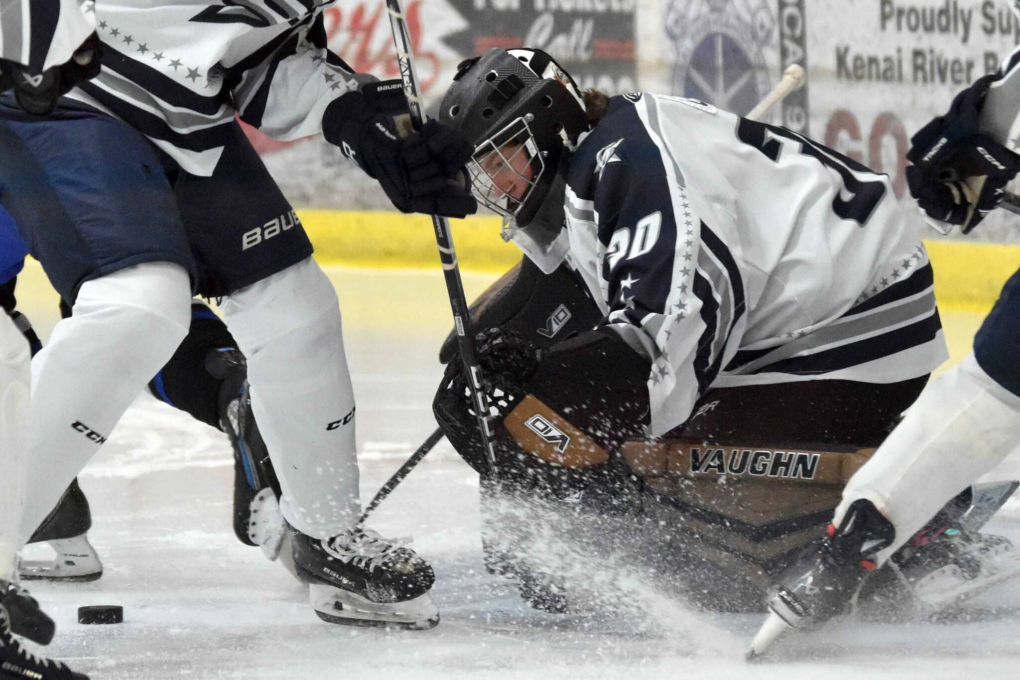 Soldotna goalie Brycen Clyde tracks the puck for a save Friday, Dec. 6, 2024, at the Soldotna Regional Sports Complex in Soldotna, Alaska. (Photo by Jeff Helminiak/Peninsula Clarion)