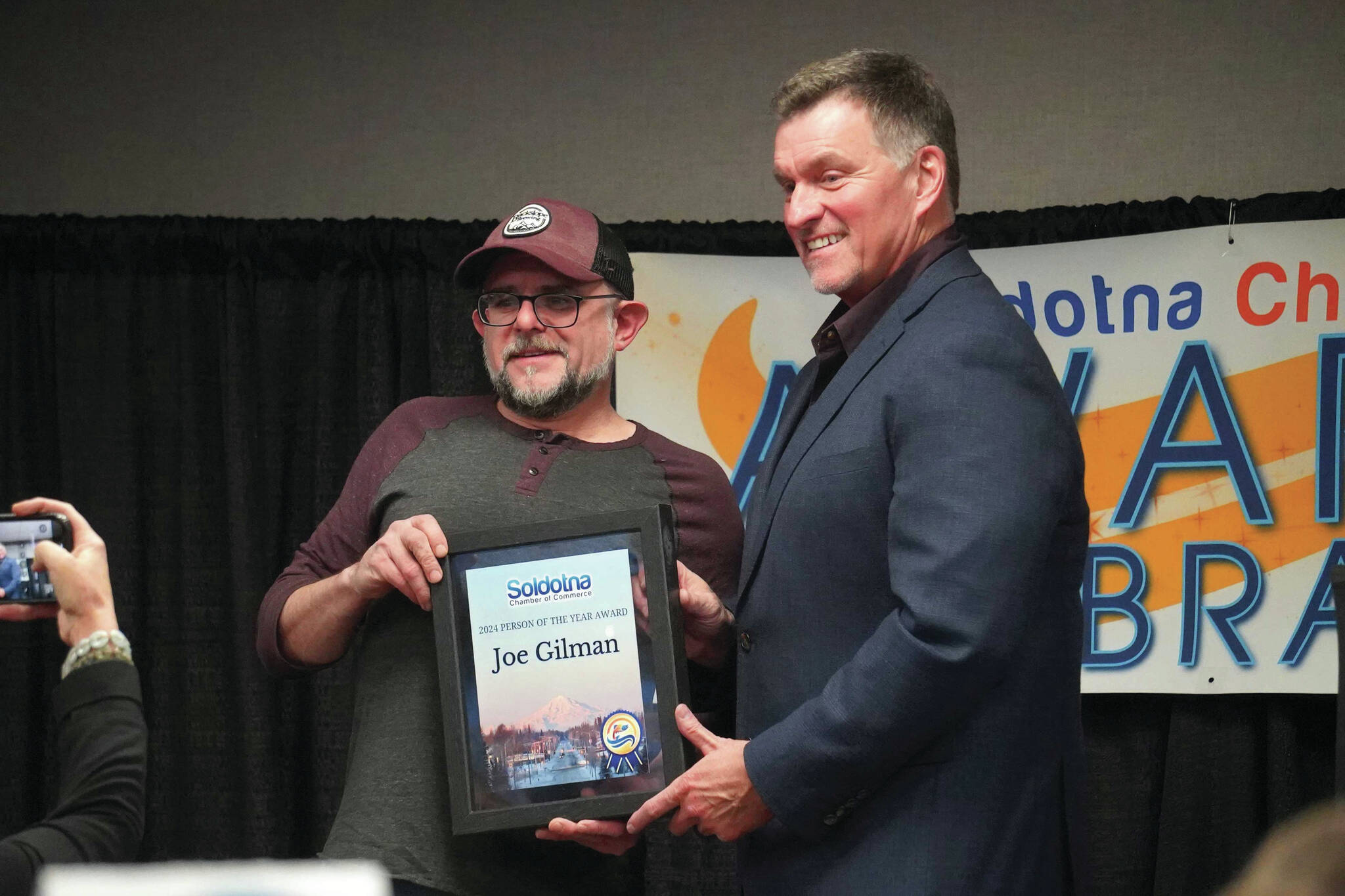 Joe Gilman is named Person of the Year during the 65th Annual Soldotna Chamber Awards Celebration at the Soldotna Regional Sports Complex on Wednesday. (Jake Dye/Peninsula Clarion)