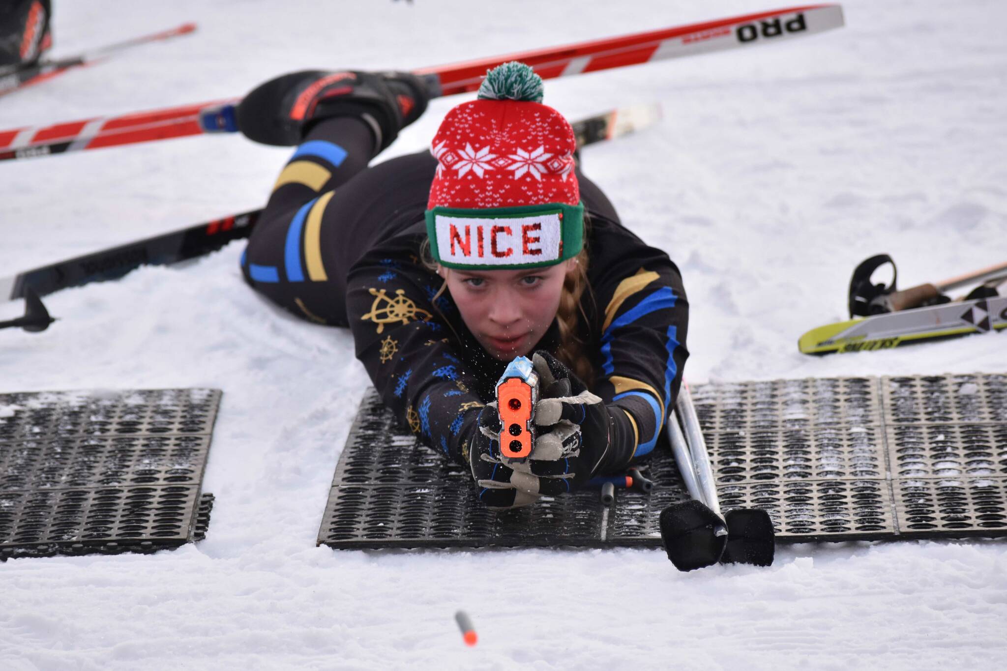 Homer's Swift Blackstock takes a shot at the Candy Cane Scramble on Friday, Dec. 20, 2024, at Tsalteshi Trails just outside of Soldotna, Alaska. (Photo by Jeff Helminiak/Peninsula Clarion)