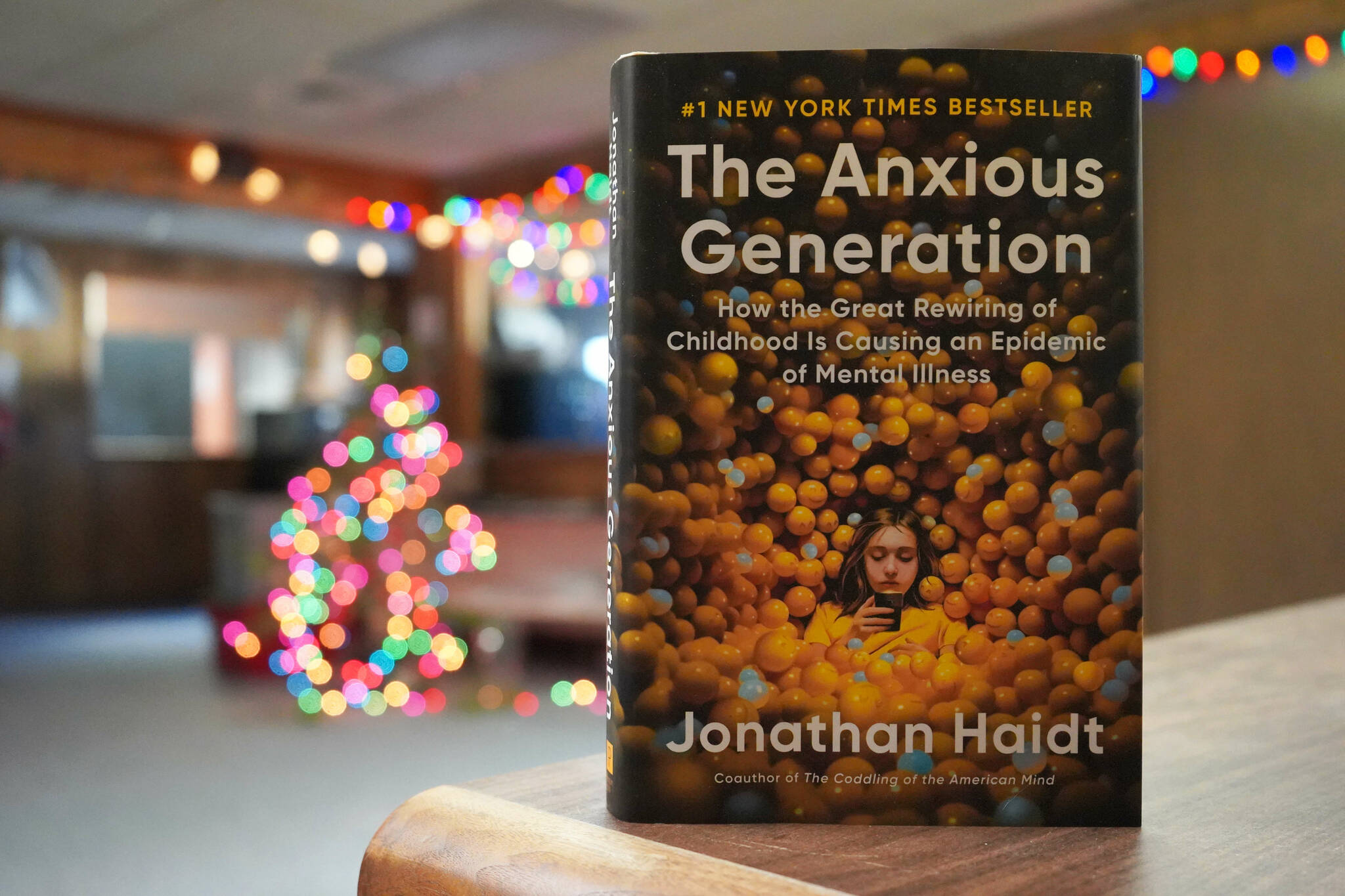 Jake Dye/Peninsula Clarion
A copy of “The Anxious Generation: How the Great Rewiring of Childhood is Causing an Epidemic of Mental Illness” rests on a desk in the Peninsula Clarion newsroom in Kenai, Alaska, on Tuesday, Jan. 7, 2025.