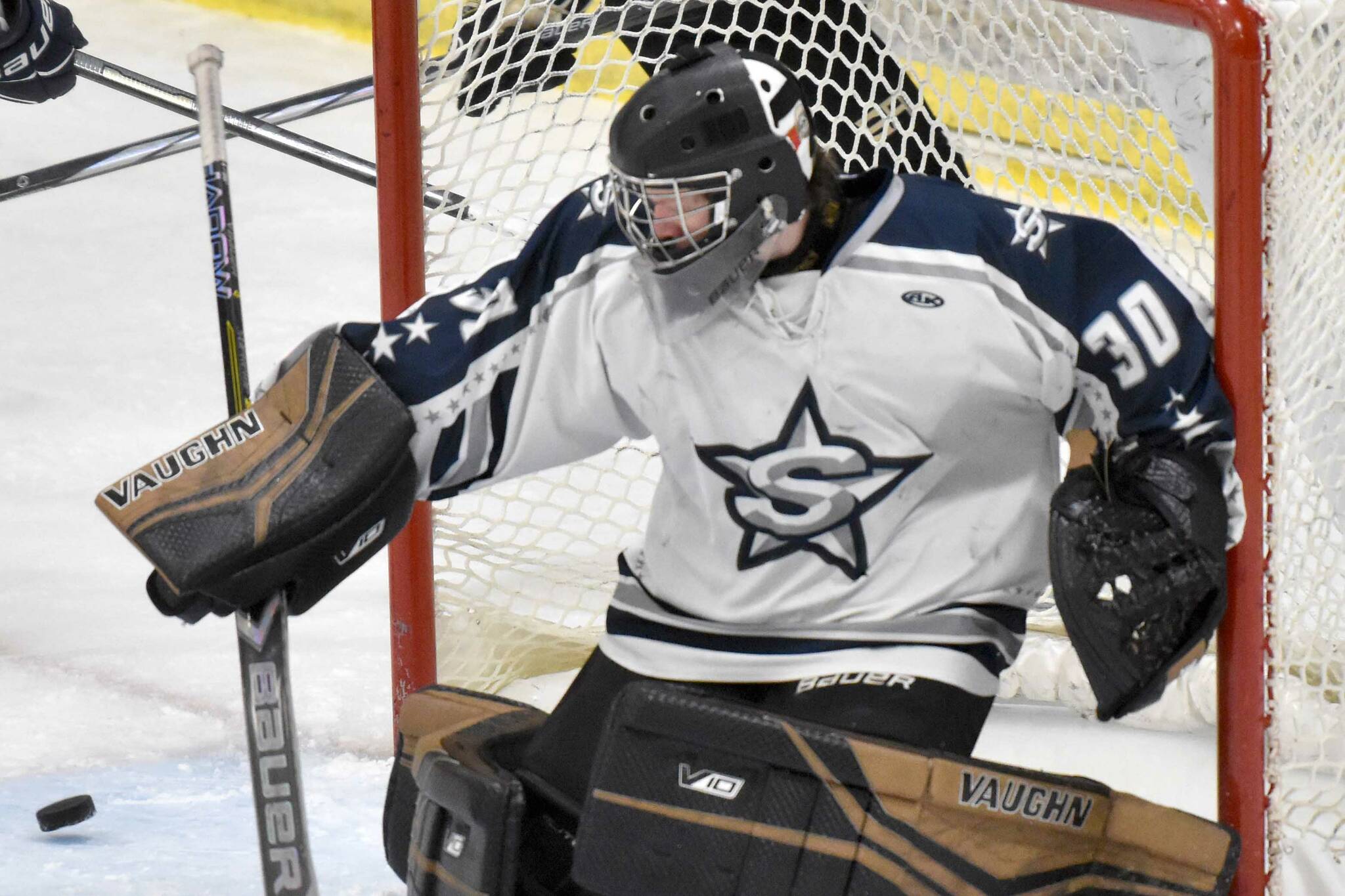 Soldotna goalie Brycen Clyde turns aside a shot Friday, Jan. 10, 2025, at the Soldotna Regional Sports Complex in Soldotna, Alaska. (Photo by Jeff Helminiak/Peninsula Clarion)