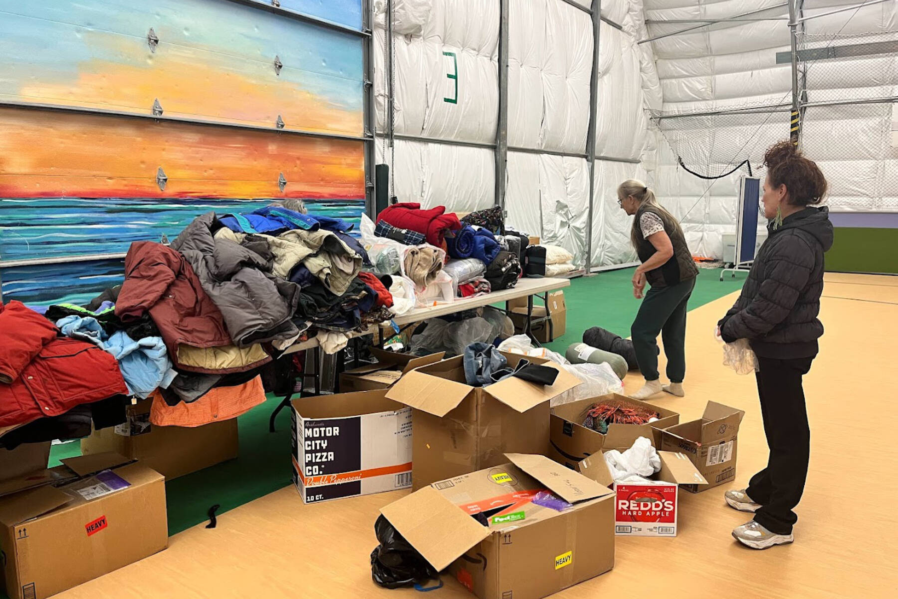 Volunteers sort winter gear prior to the start of the annual Community Resource Connect on Tuesday, Jan. 30, 2024, at the SPARC in Homer, Alaska. Photo provided by Derotha Ferraro