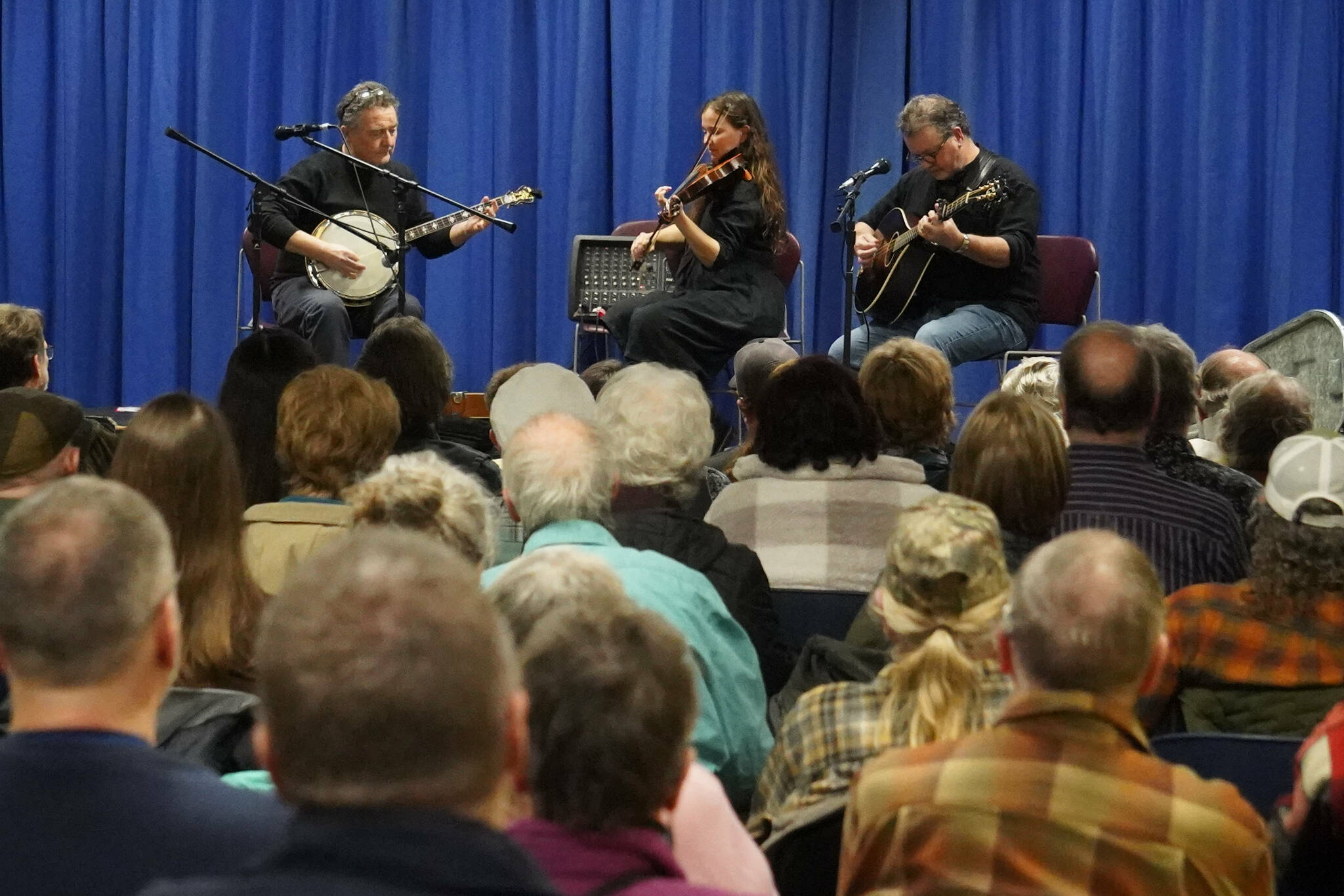 John Walsh, Jannell Canerday and Pat Broaders perform during “An Evening of Traditional Irish Music” at Kenai Peninsula College in Soldotna, Alaska, on Friday, Jan. 24, 2025. (Jake Dye/Peninsula Clarion)