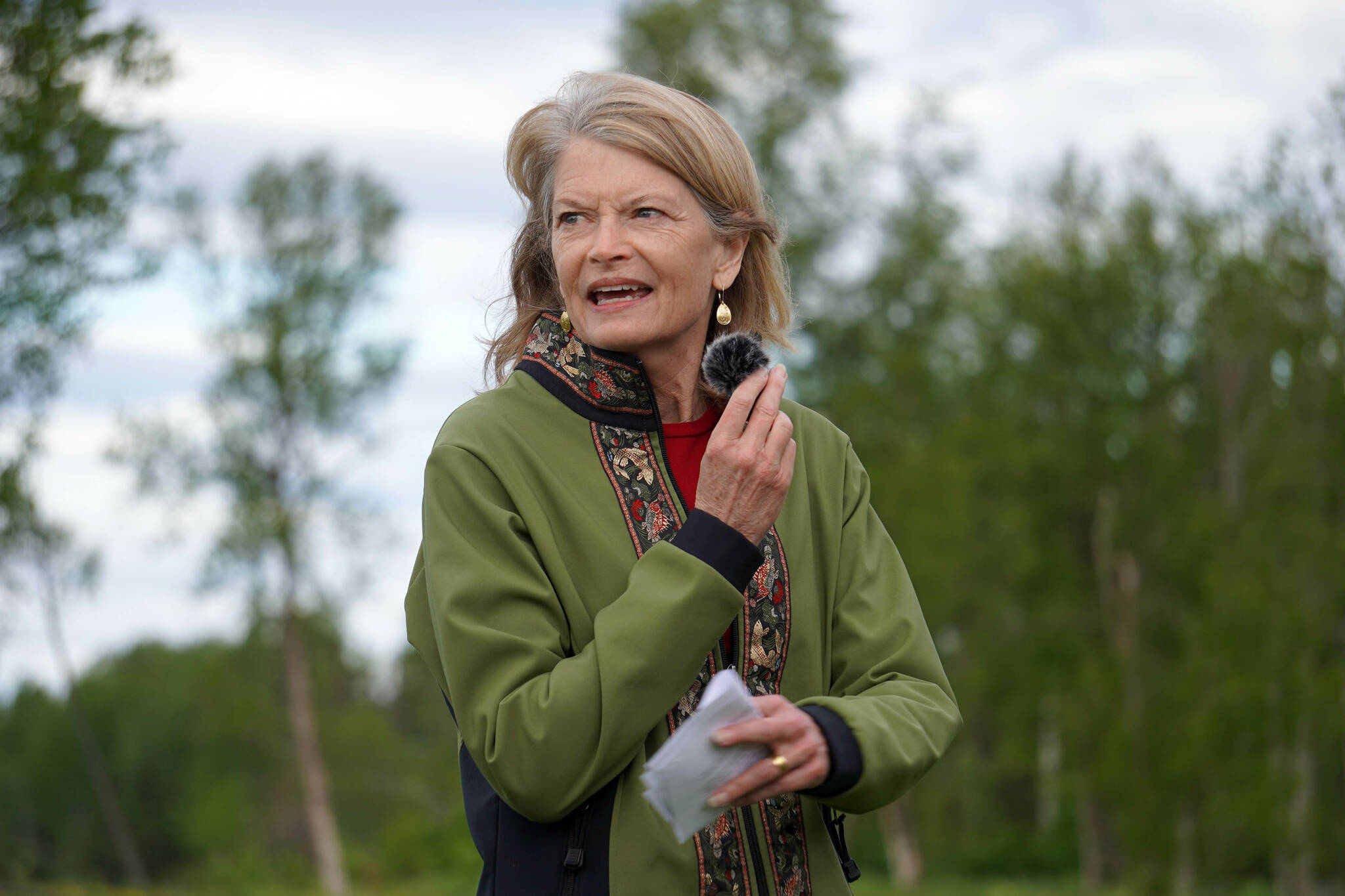 Sen. Lisa Murkowski speaks at the ribbon-cutting for the Kenai River Bluff Stabilization Project on the bluff above the Kenai River in Kenai, Alaska, on Monday, June 10, 2024. (Jake Dye/Peninsula Clarion)