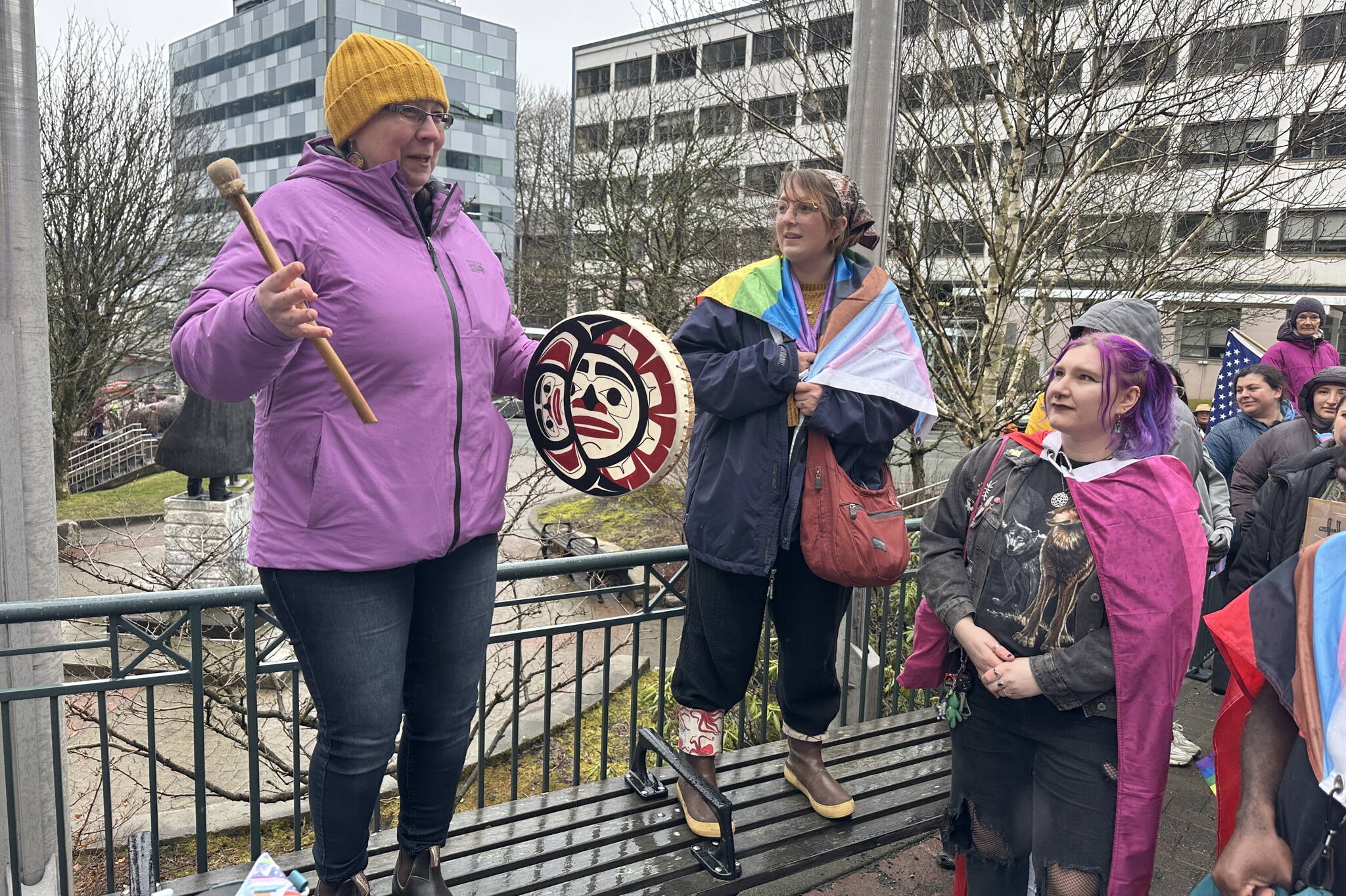 Daaljíni Mary Cruise, left, offers encouragement to participants in a Unity for the Queer Community rally at the Alaska State Capitol on Sunday afternoon. (Mark Sabbatini / Juneau Empire)